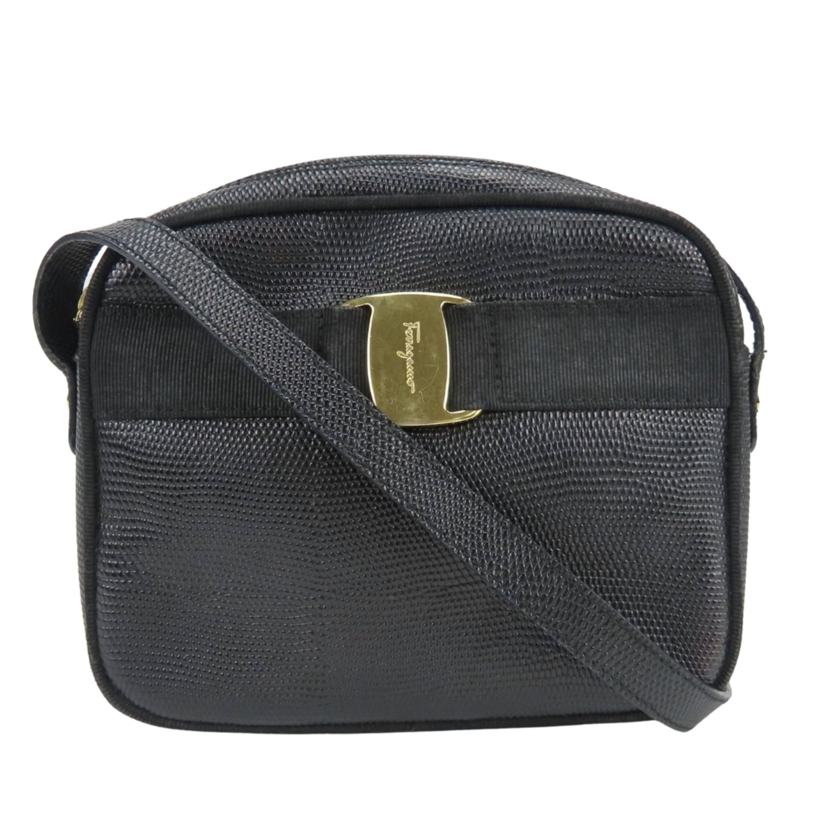 Shoulder bag leather by Salvatore Ferragamo: Shoulder bag leather by Salvatore Ferragamo Black leather shoulder bag by Salvatore Ferragamo, featuring gold hardware and precise measurements at 16cm x 19cm x 7cm. This stylish accessory boasts a