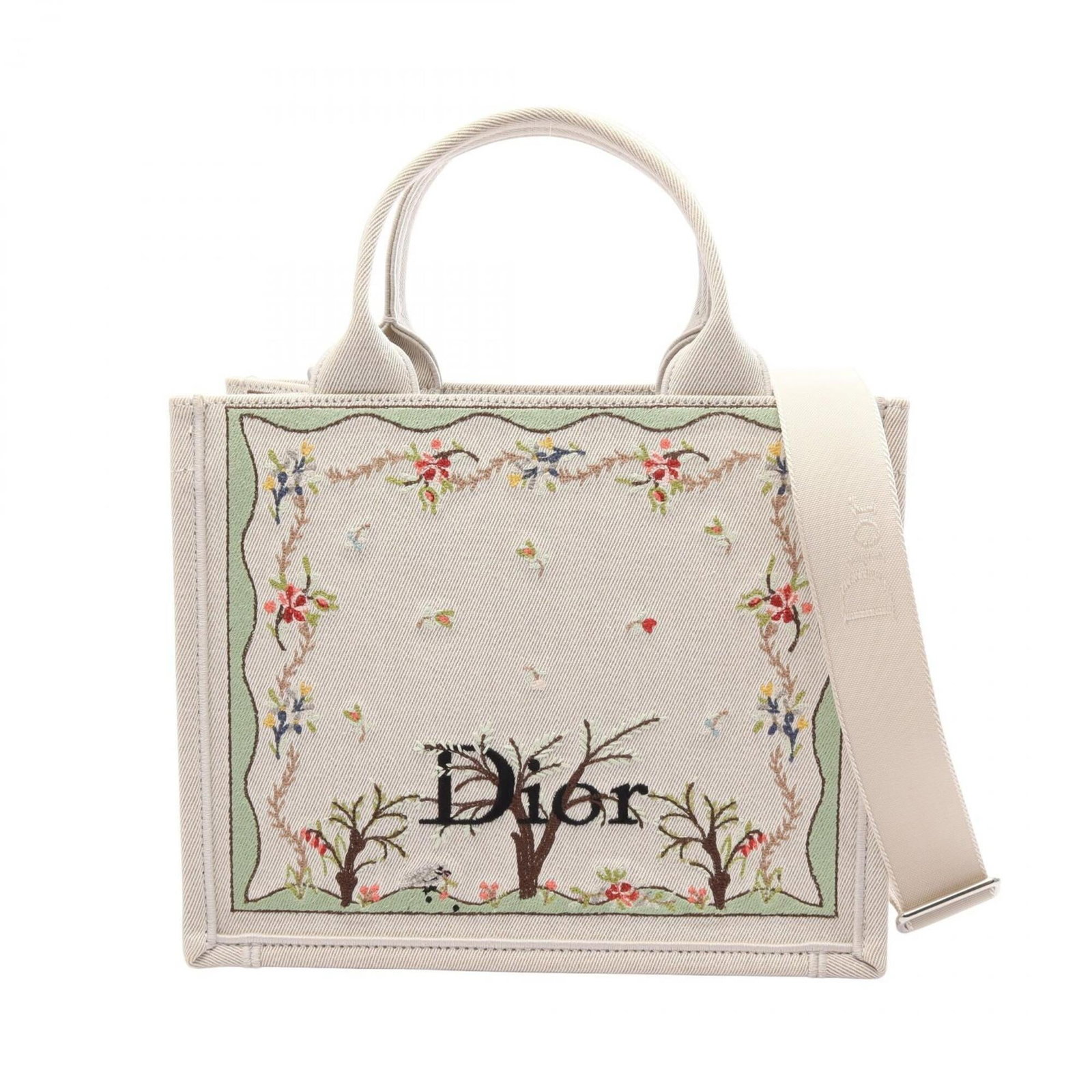 Canvas by Dior Christian: Canvas by Dior Christian Canvas by Dior Christian, a vibrant handbag featuring an ivory and multi-color canvas design. Measuring 22cm x 27cm x 13cm, it boasts a unique size and color combination that