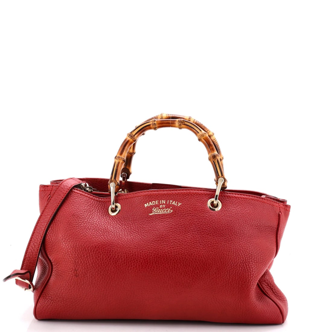Gucci leather tote shopper bamboo medium: Gucci leather tote shopper bamboo medium Red leather Gucci bamboo shopper tote in medium size with gold tone hardware, featuring a neutral interior and minor signs of wear. The exterior has creases,