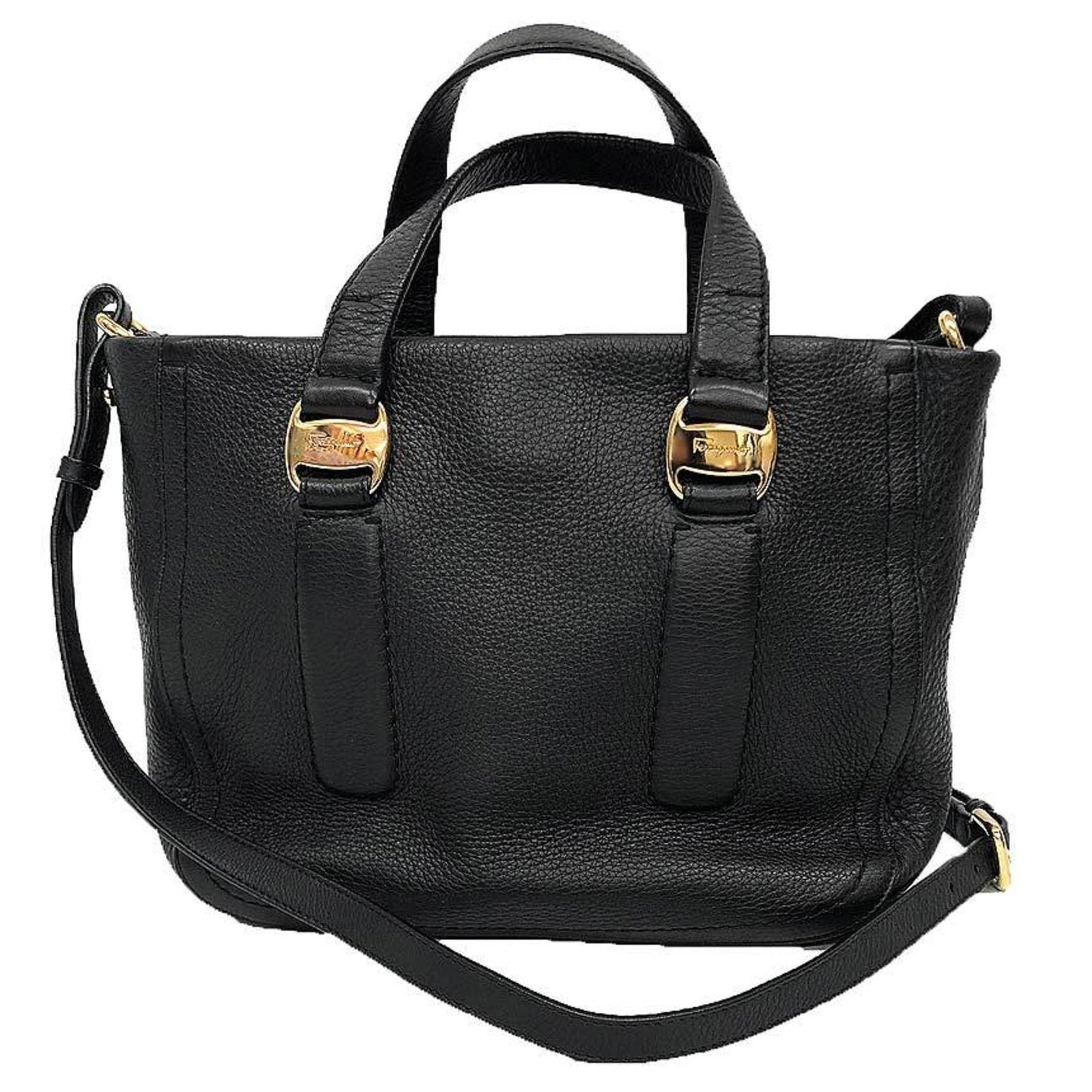 Handbag Salvatore Ferragamo Leather Shoulder: Handbag Salvatore Ferragamo Leather Shoulder Black leather shoulder bag from Salvatore Ferragamo, featuring a classic design with clean lines and elegant proportions. Includes dust bag and adjustable