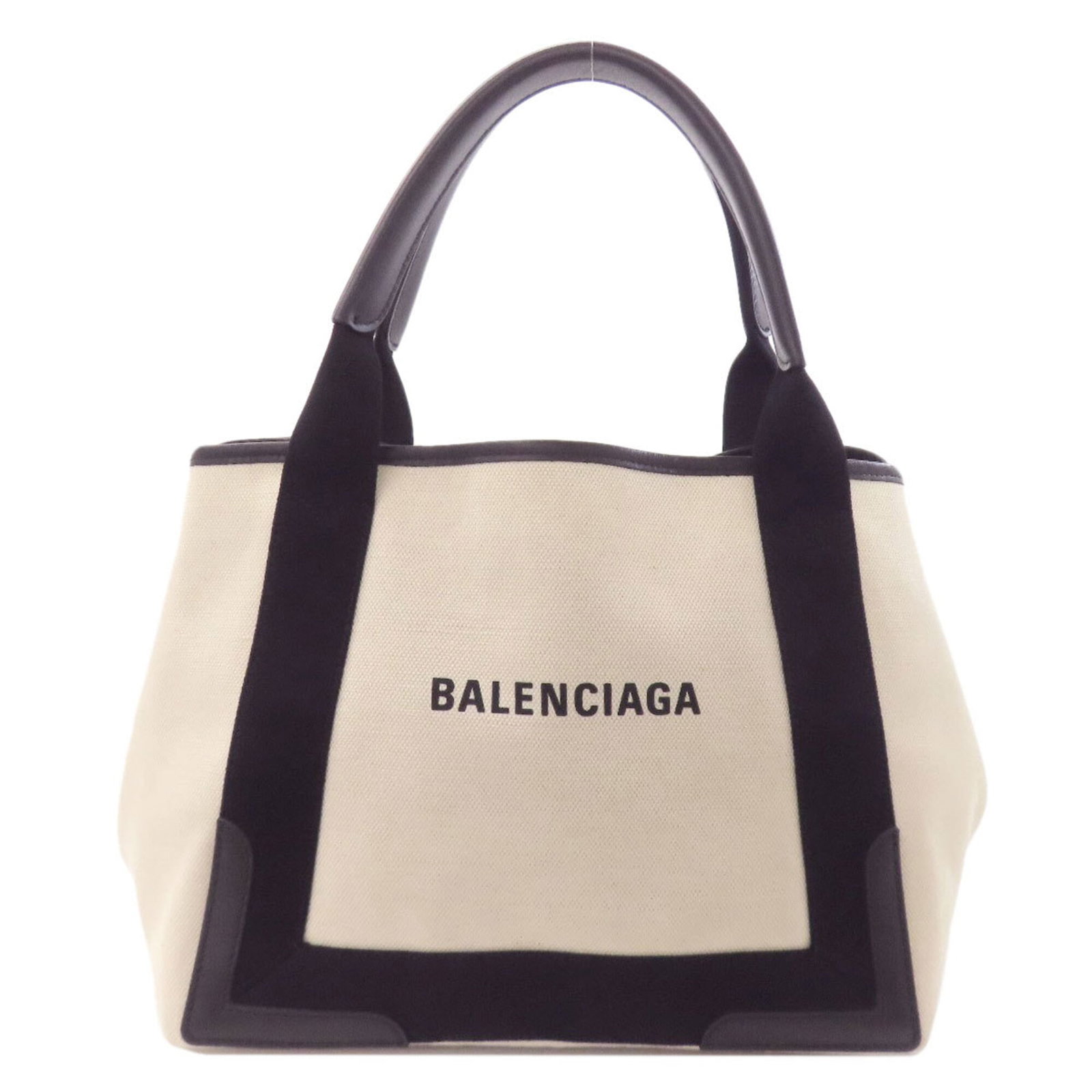 Balenciaga Handbag Pouch Canvas: Balenciaga Handbag Pouch Canvas Canvas pouch from Balenciaga, measuring 23cm x 29cm x 18cm. This black and white canvas handbag features a classic design with clean lines and minimal embellishments.