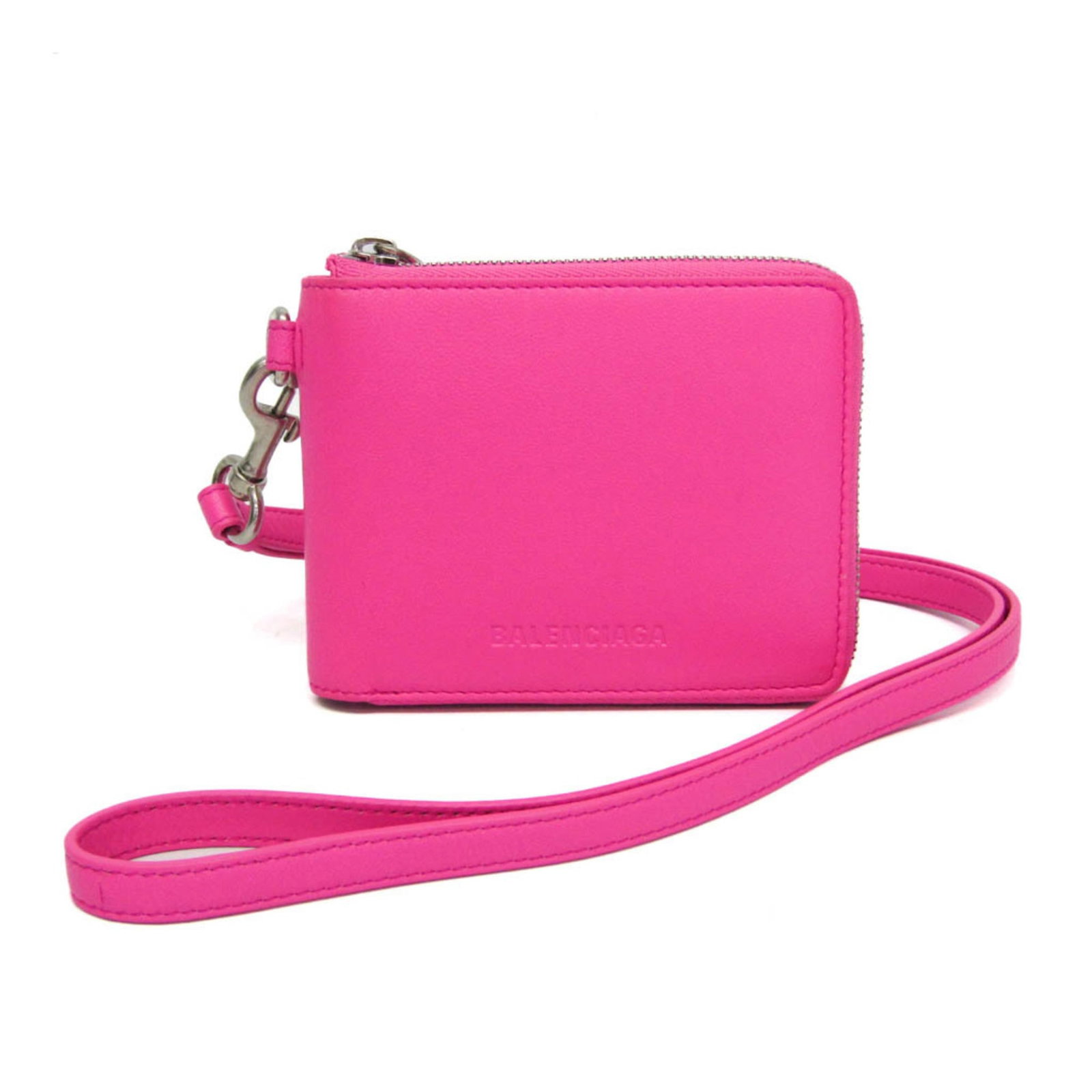 Balenciaga Wallet (Bi-Fold) Leather: Balenciaga Wallet (Bi-Fold) Leather Pink leather bi-fold wallet from Balenciaga, featuring a zipper closure and three card slots. The compact design measures 9.5cm x 11.5cm x 2cm and comes with a 50cm