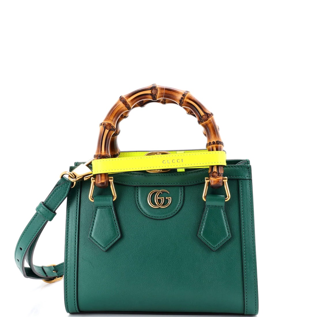 Leather Mini Handle Bamboo Gucci Tote Diana: Leather Mini Handle Bamboo Gucci Tote Diana The Gucci Leather Mini Handle Bamboo Tote Diana in green features a stylish cross-body design with a bamboo handle and leather exterior, making it a