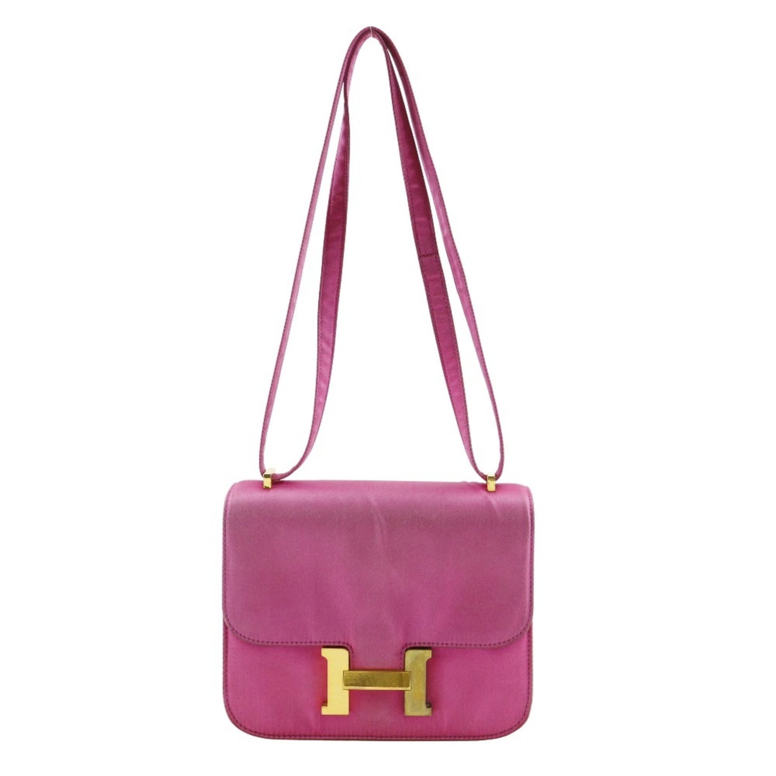 Hermes Shoulder Bag Silk: Hermes Shoulder Bag Silk The Hermes Shoulder Bag Silk boasts elegant simplicity with its pink silk fabric and gold hardware, creating a sophisticated look. Made from high-quality materials, it