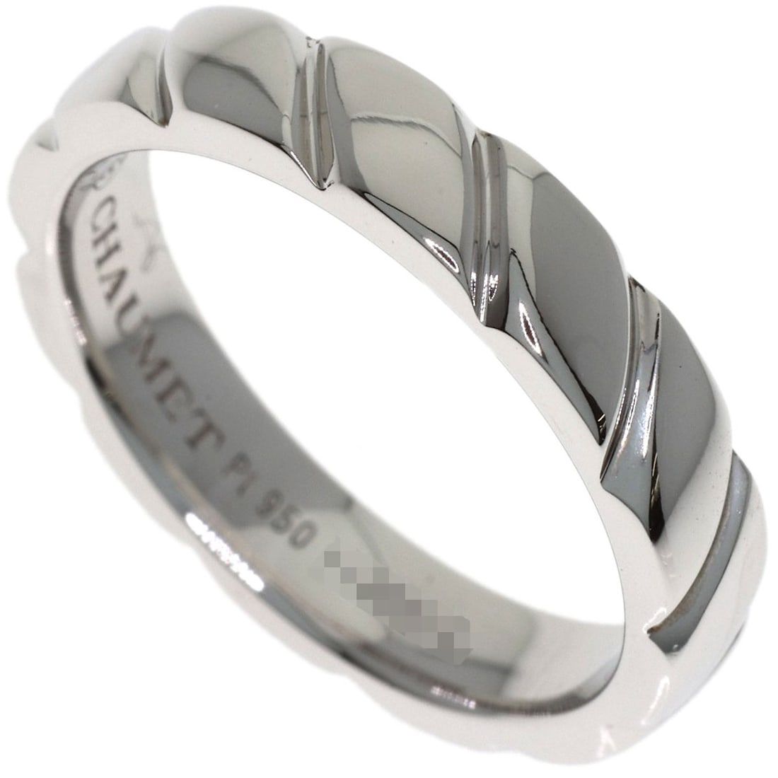 Chaumet Torsade Ring Platinum Pt950: Chaumet Torsade Ring Platinum Pt950 Chaumet's Torsade Ring is crafted from platinum, with a silver exterior color and a purity of 950. This stylish ring features no main stone, making it a sleek and