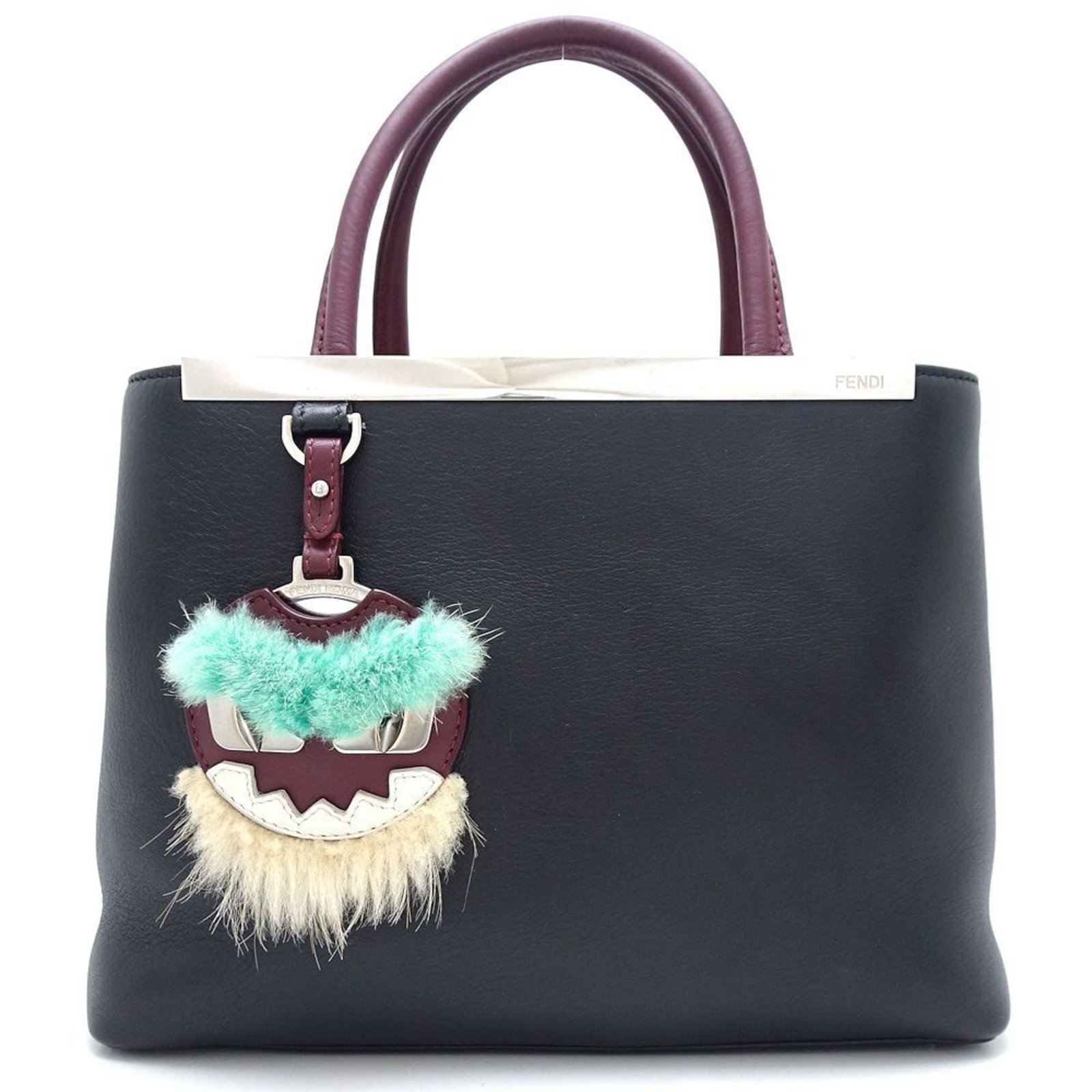 Fendi Handbag Leather: Fendi Handbag Leather Black Fendi Handbag Leather. Made from high-quality leather, this handbag measures 20cm x 27cm x 13cm and features a charm accessory. The bag's sleek design makes it a stylish