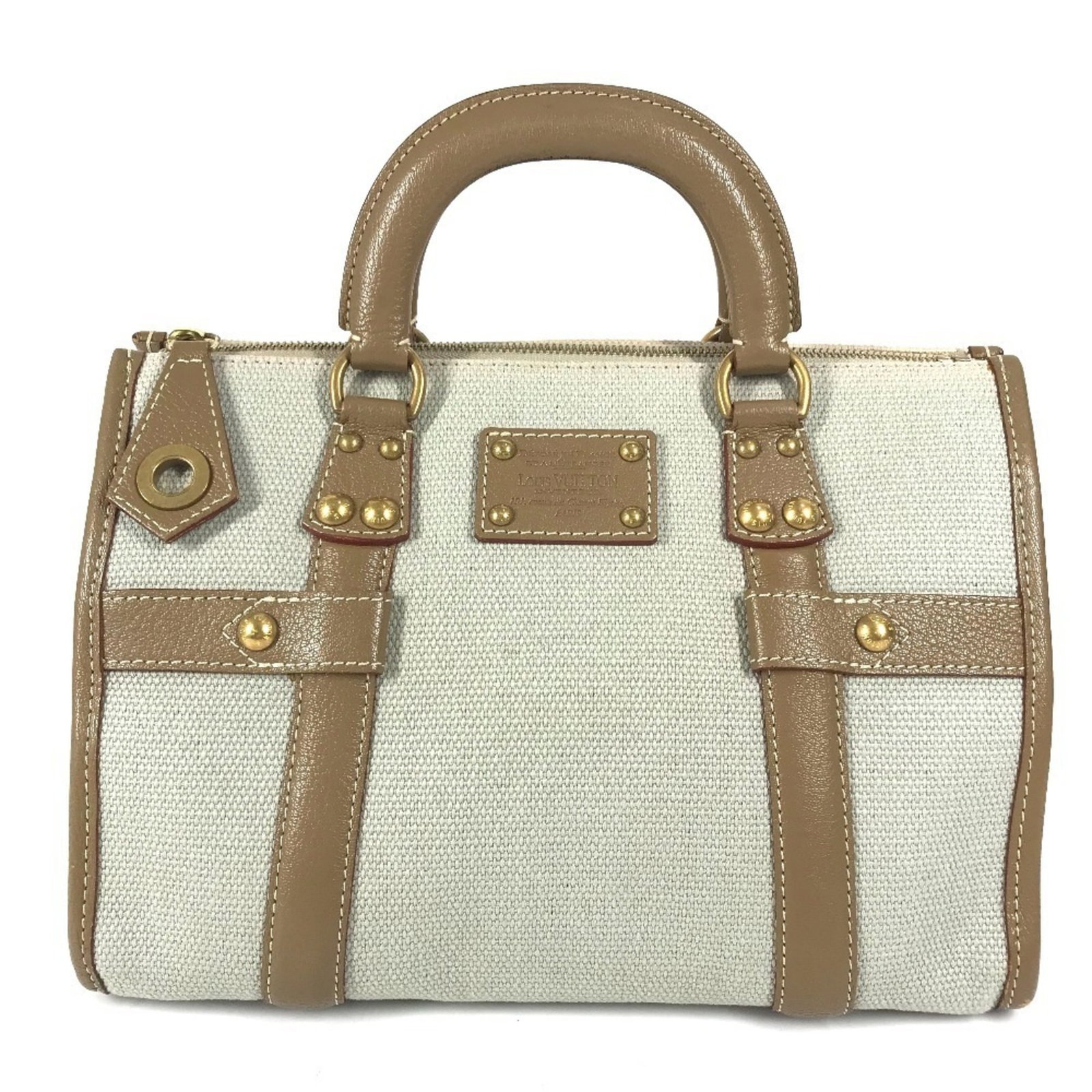 Louis Vuitton Handbag Tote Bag Leather Canvas: Louis Vuitton Handbag Tote Bag Leather Canvas Louis Vuitton Handbag Tote Bag Leather Canvas. This Louis Vuitton tote bag features high-quality leather and canvas materials, with a classic beige color.