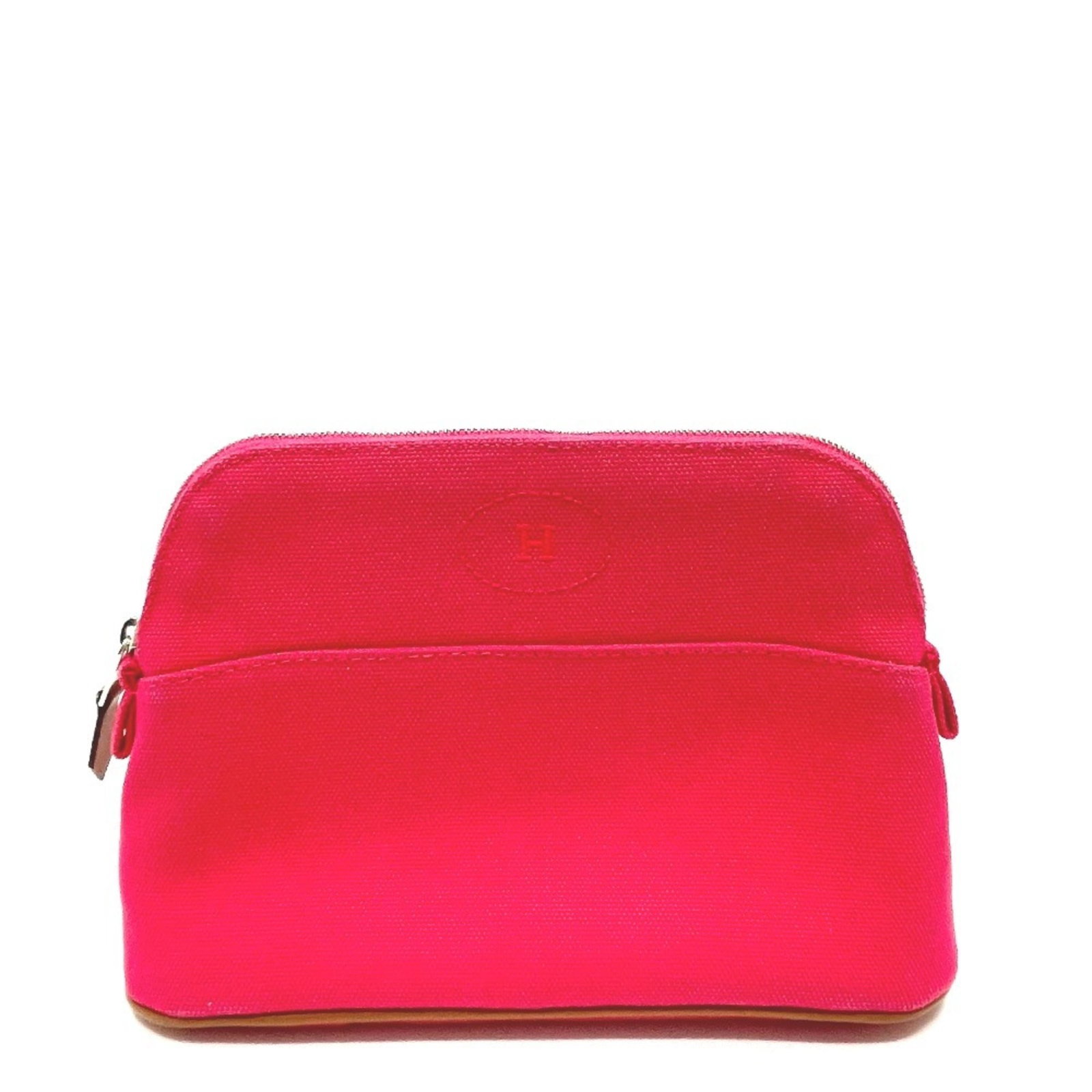 Canvas Pouch Hermes: Canvas Pouch Hermes Canvas Pouch from the Hermes Bolide Line, featuring a vibrant pink canvas material and a sturdy zipper closure. This compact pouch measures 14.5cm x 20.5cm x 7cm, making it a
