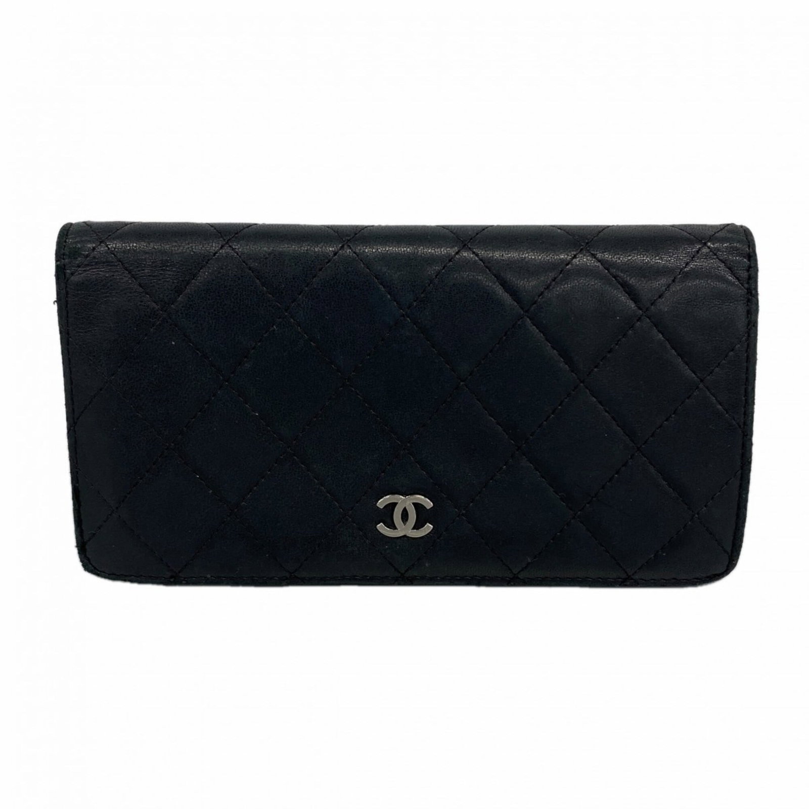 Chanel Long Wallet (Bi-Fold) Leather: Chanel Long Wallet (Bi-Fold) Leather The sleek and sophisticated Chanel Long Wallet in black lambskin leather boasts a classic bi-fold design, perfectly sized for everyday use. Measuring just 10cm x