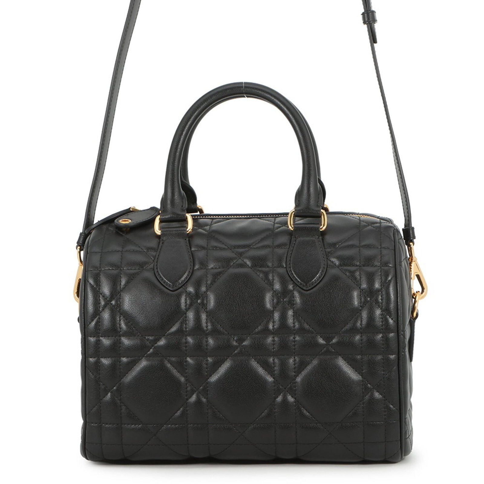 Handbag Christian Dior Leather: Handbag Christian Dior Leather Black Calfskin Leather Handbag from Christian Dior, featuring gold hardware and a zipper closure. Measuring 19cm x 26cm x 16.5cm, it weighs 940g and has adjustable