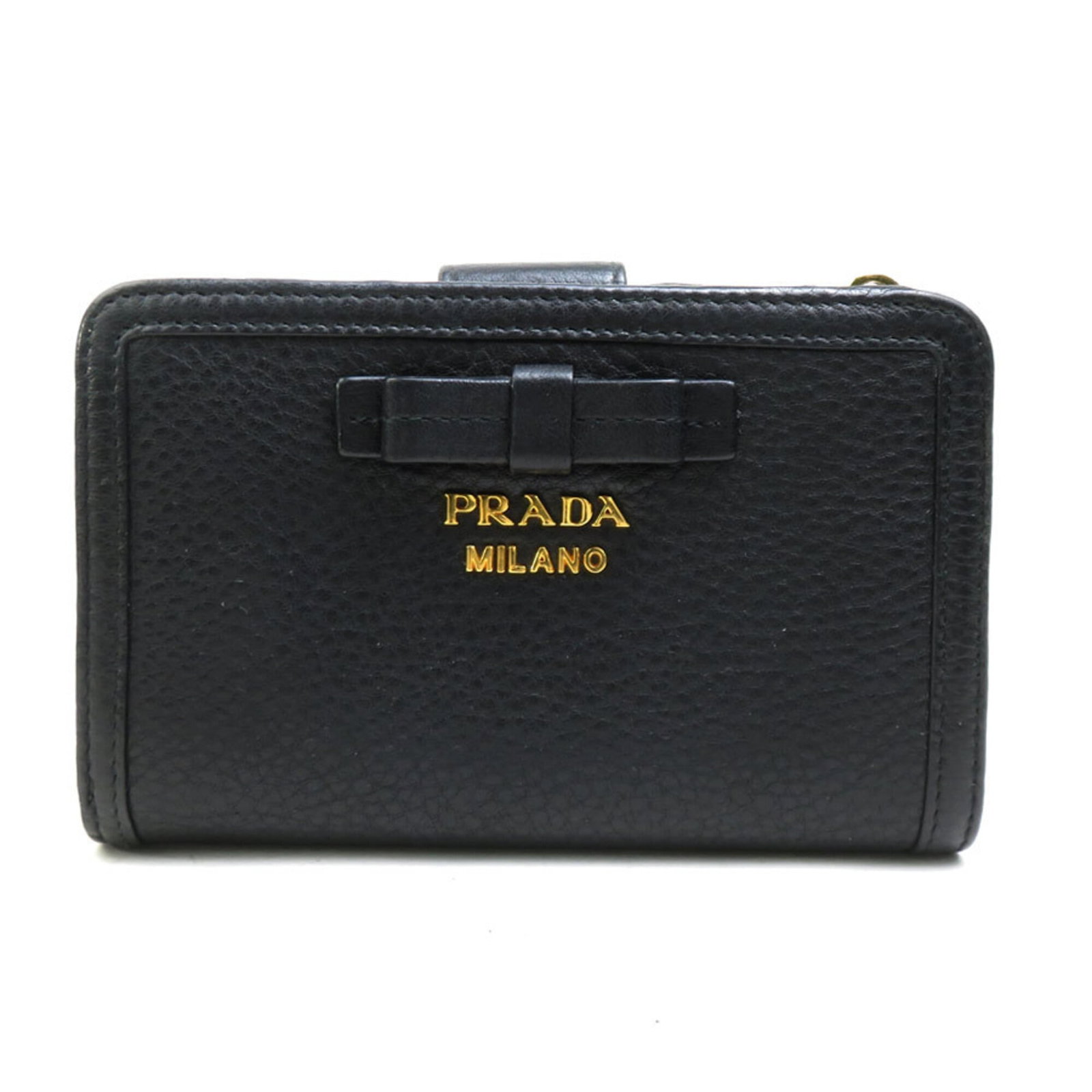 Prada Wallet (Bi-Fold) Leather: Prada Wallet (Bi-Fold) Leather Prada's bi-fold leather wallet features sleek black design with precise measurements, measuring 9cm x 14cm x 2.5cm, making it a compact and stylish accessory for everyda