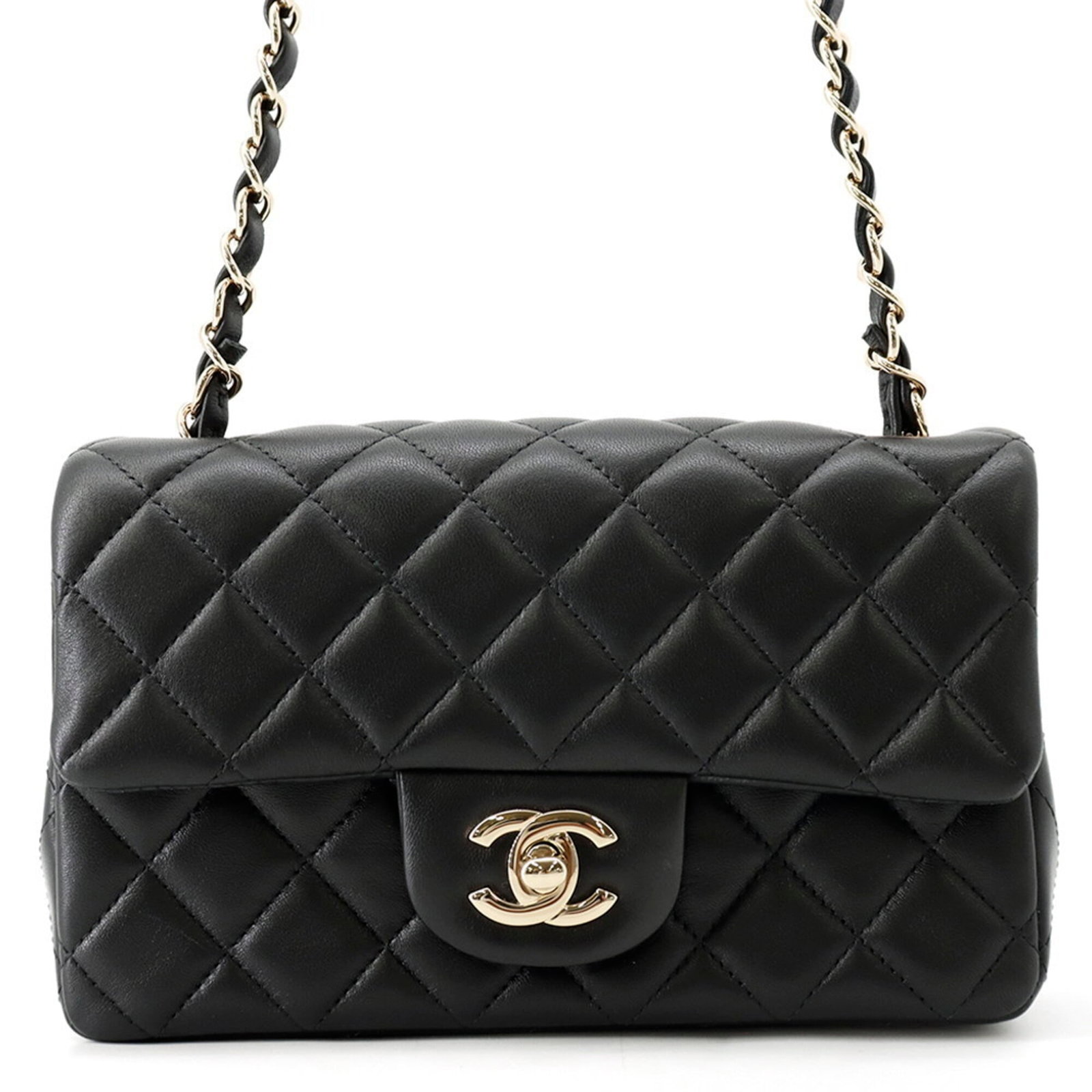 Chanel Handbag Shoulder Bag Leather: Chanel Handbag Shoulder Bag Leather Chanel's iconic Matelasse leather shoulder bag boasts sleek, champagne gold hardware and a timeless black finish. With its spacious interior and adjustable strap,