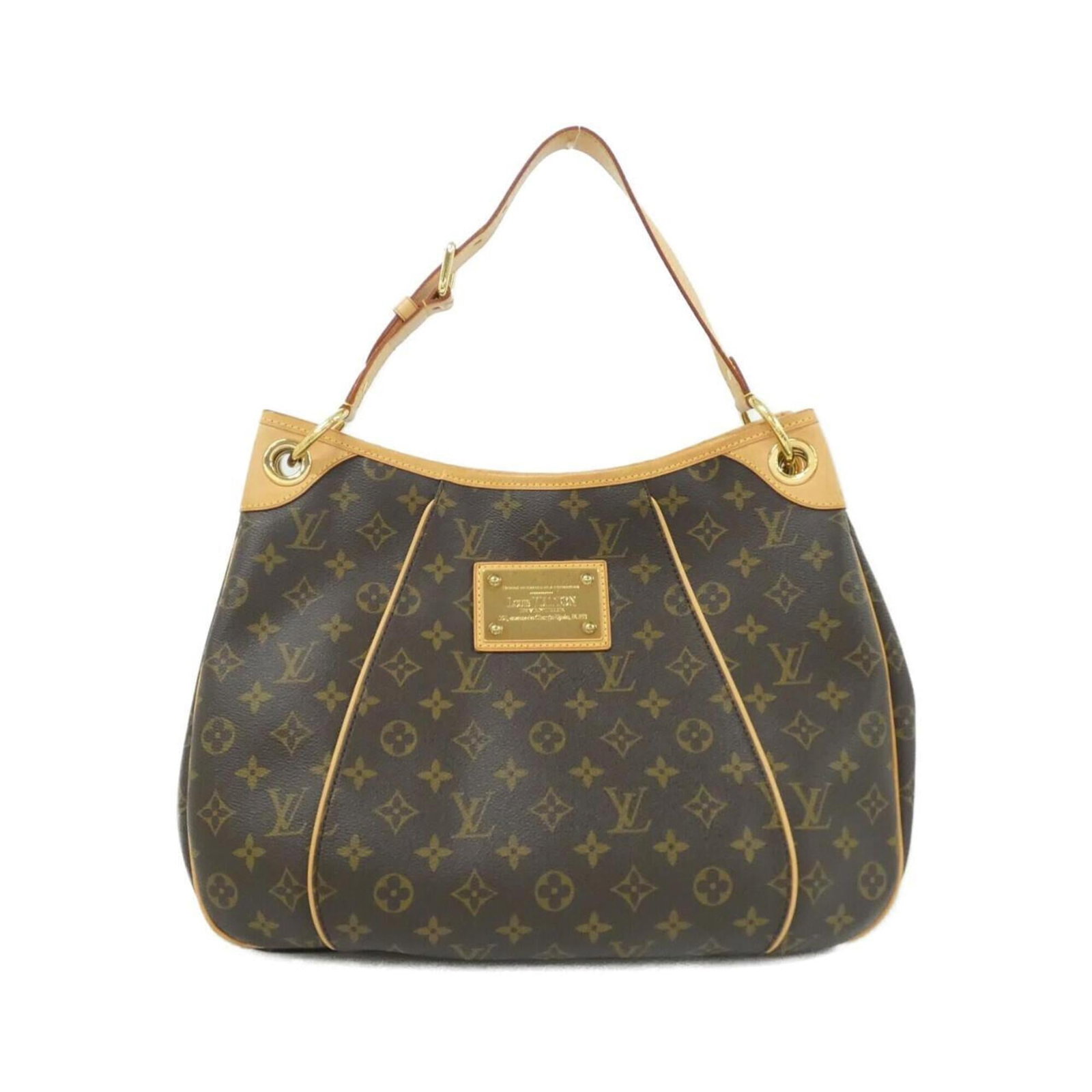 Shoulder Bag Monogram By Louis Vuitton: Shoulder Bag Monogram By Louis Vuitton Monogrammed luxury at its finest, this Louis Vuitton shoulder bag boasts the iconic monogram pattern in rich Marron hue. With its sleek design and spacious inter