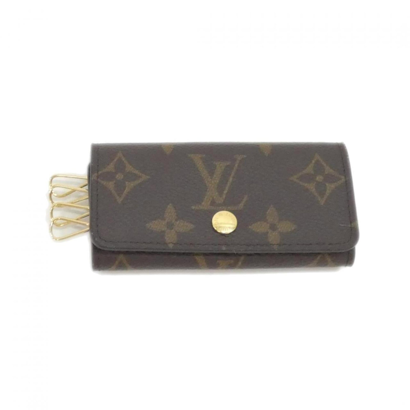 Louis Vuitton Keycase Coated Canvas: Louis Vuitton Keycase Coated Canvas Coated canvas construction provides durability and protection for your keys. The classic brown color and compact size make it a versatile accessory. Measuring just 