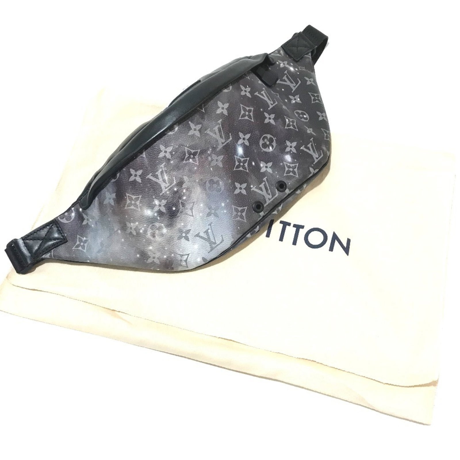 Canvas Fanny Pack Louis Vuitton: Canvas Fanny Pack Louis Vuitton Canvas Fanny Pack in Black and Silver from Louis Vuitton. This stylish fanny pack features a canvas material, black and silver color combination, and measures 20cm x 47
