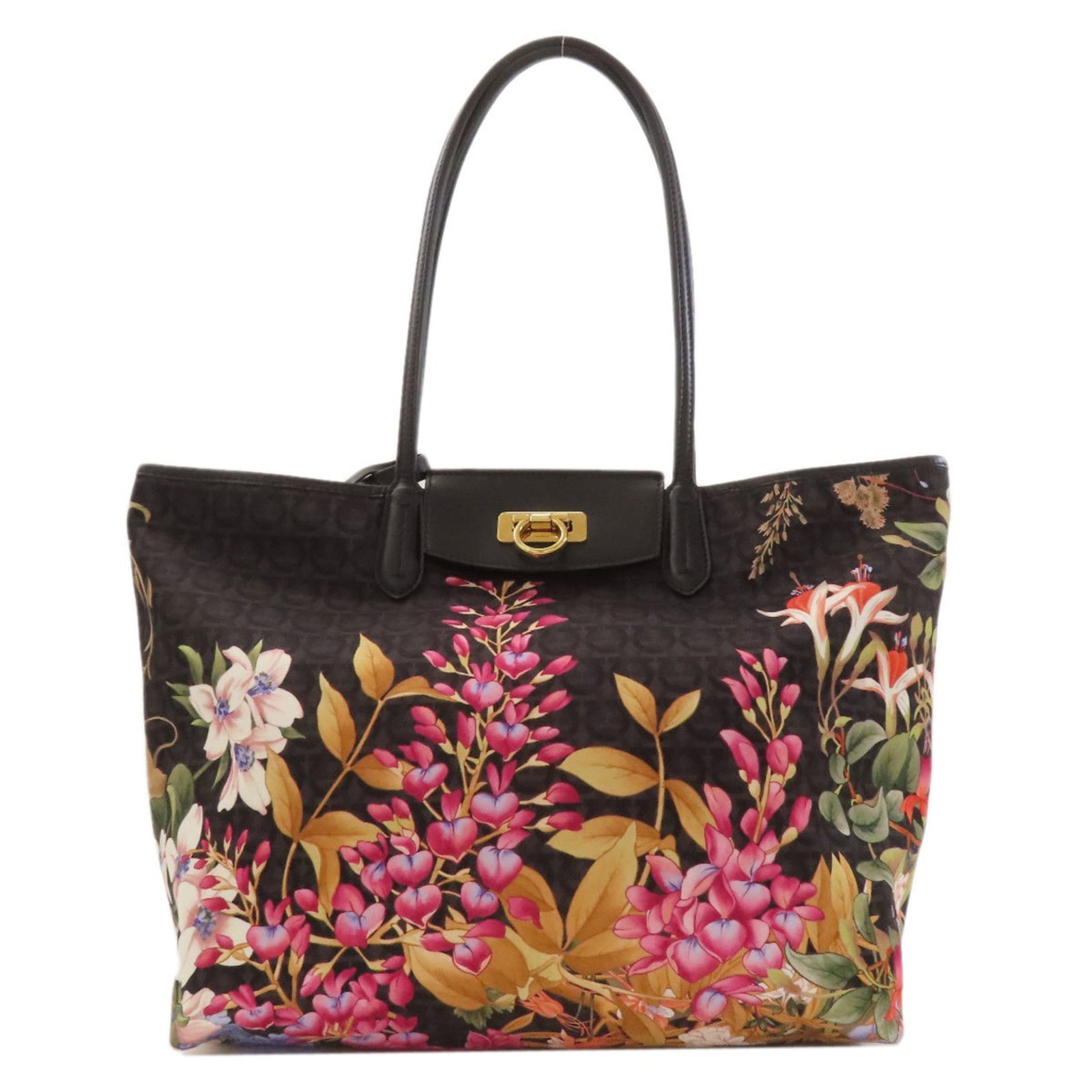 Ferragamo Salvatore Tote Nylon Bag: Ferragamo Salvatore Tote Nylon Bag The Salvatore Ferragamo tote nylon bag features a sleek black design with a durable nylon material, measuring 27cm x 41cm x 15cm. The bag includes a pouch accessory