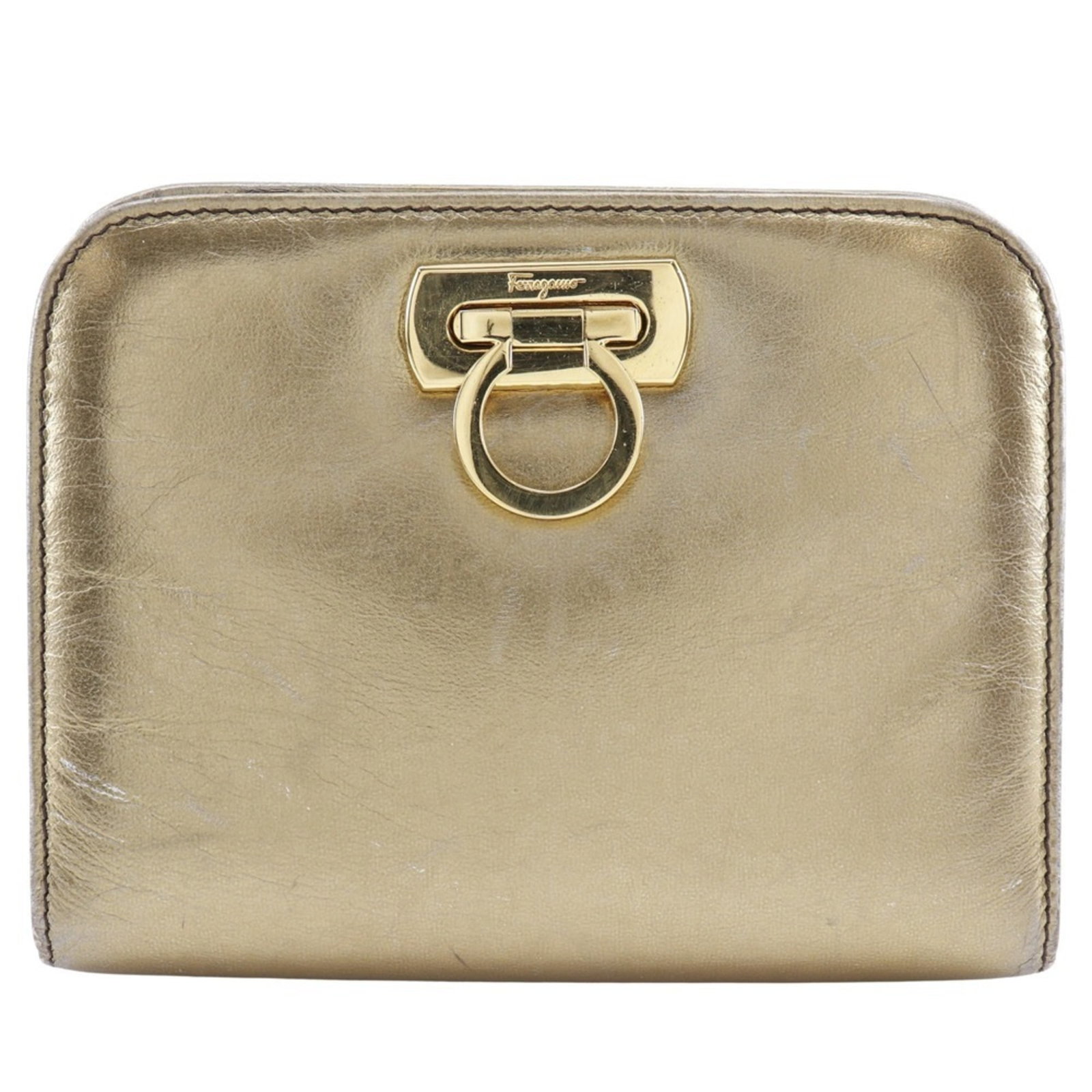 Shoulder bag leather by Salvatore Ferragamo: Shoulder bag leather by Salvatore Ferragamo Shoulder bag made from high-quality leather, specifically calfskin, with a gold color and adjustable shoulder strap. This stylish accessory features the