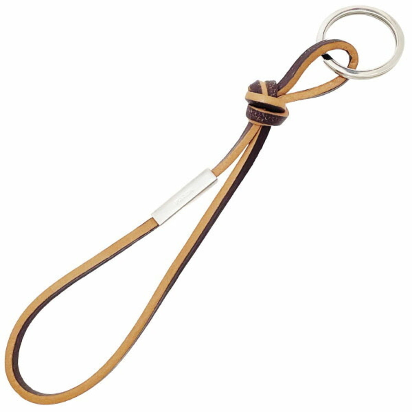 Keyring Brass Leather by Prada: Keyring Brass Leather by Prada Brass and leather come together in a sleek keyring from Prada, featuring a classic design. Made with brass and adorned with leather, this accessory adds a touch of
