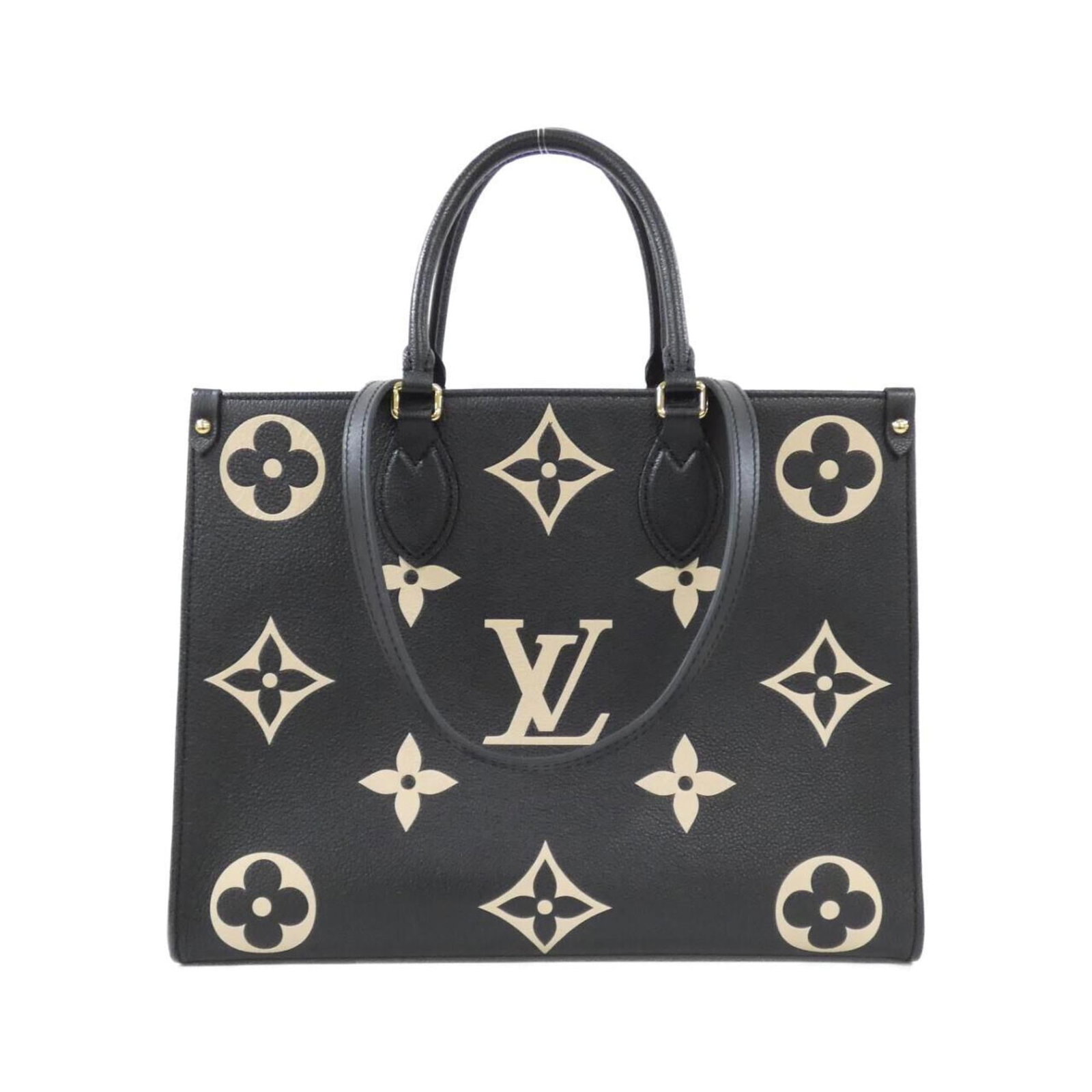 Louis Vuitton Handbag Leather: Louis Vuitton Handbag Leather Calfskin leather construction, a hallmark of Louis Vuitton's iconic designs. This beige, bicolor, and black handbag features a classic size and shape, making it a versati