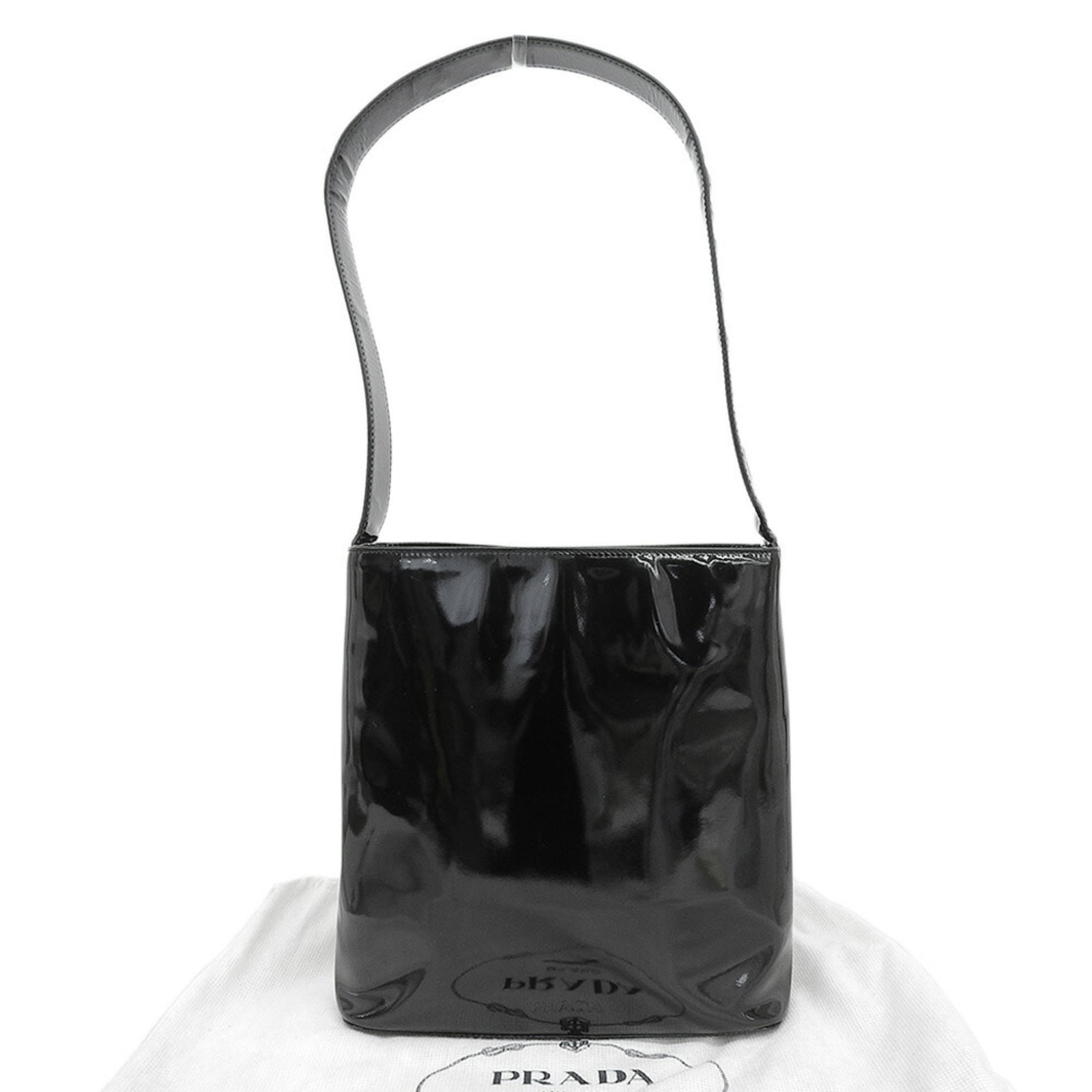 Shoulder Bag Leather by Prada: Shoulder Bag Leather by Prada Black leather shoulder bag by Prada, crafted from high-quality materials and featuring an enamel finish. Measuring 23cm x 22cm x 10.3cm, this stylish accessory boasts a s