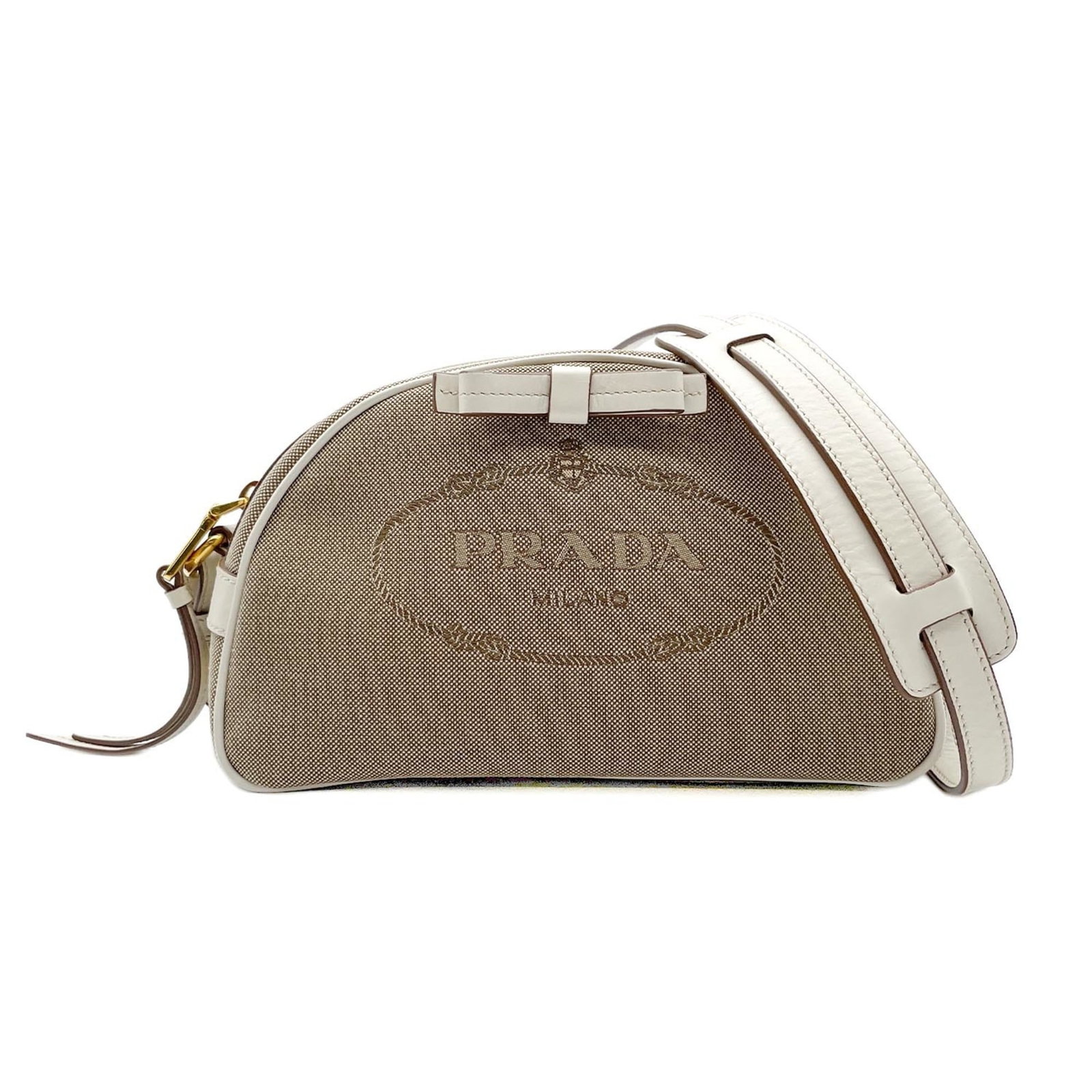 Prada Shoulder Bag Canvas Leather: Prada Shoulder Bag Canvas Leather Canvas and leather come together in this classic Prada shoulder bag, with clean lines and understated elegance. Measuring 13cm x 22cm x 9cm, it's a compact yet stylis