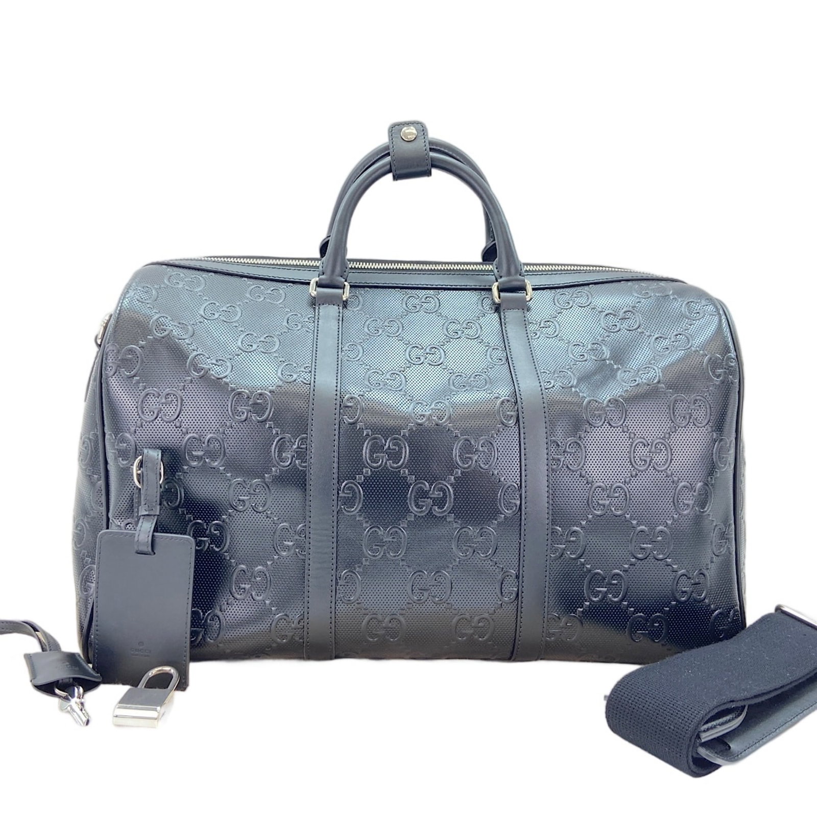 Gucci Boston Bag: Gucci Boston Bag The Gucci Boston Bag is a sleek and sophisticated black handbag with a signature design. Measuring 29cm x 45cm x 25cm, it features adjustable straps that fall between 125cm - 130cm in
