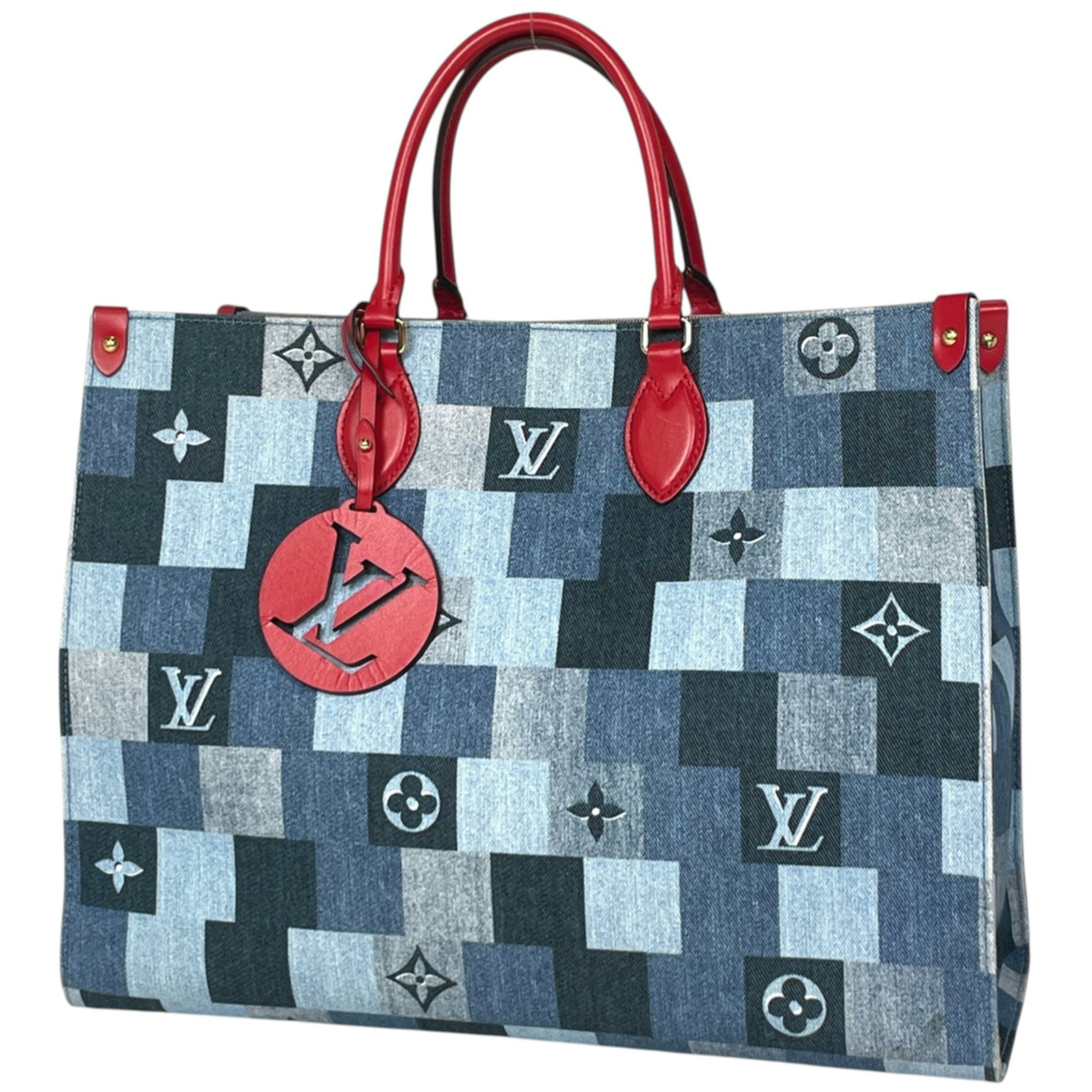 Louis Vuitton handbag monogram denim: Louis Vuitton handbag monogram denim Blue and red monogram denim Louis Vuitton handbag with dimensions 32cm x 41cm x 17cm. This iconic design features the signature LV monogram pattern in a unique den