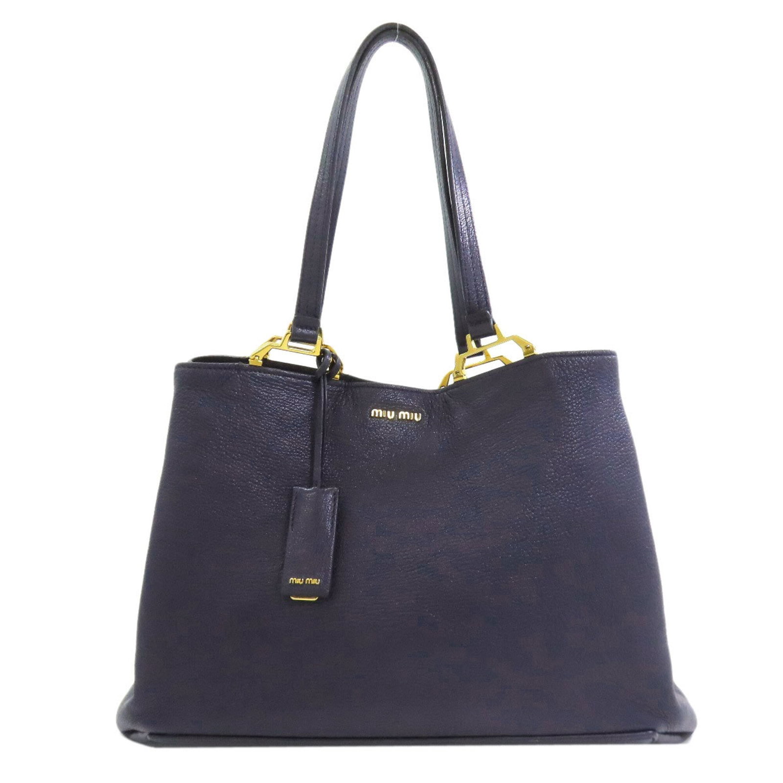 Miu Tote Bag Leather: Miu Tote Bag Leather Blue Miu Miu Leather Tote Bag. Made from high-quality leather, this tote bag features a classic design with a blue color that adds a touch of sophistication to any outfit. With