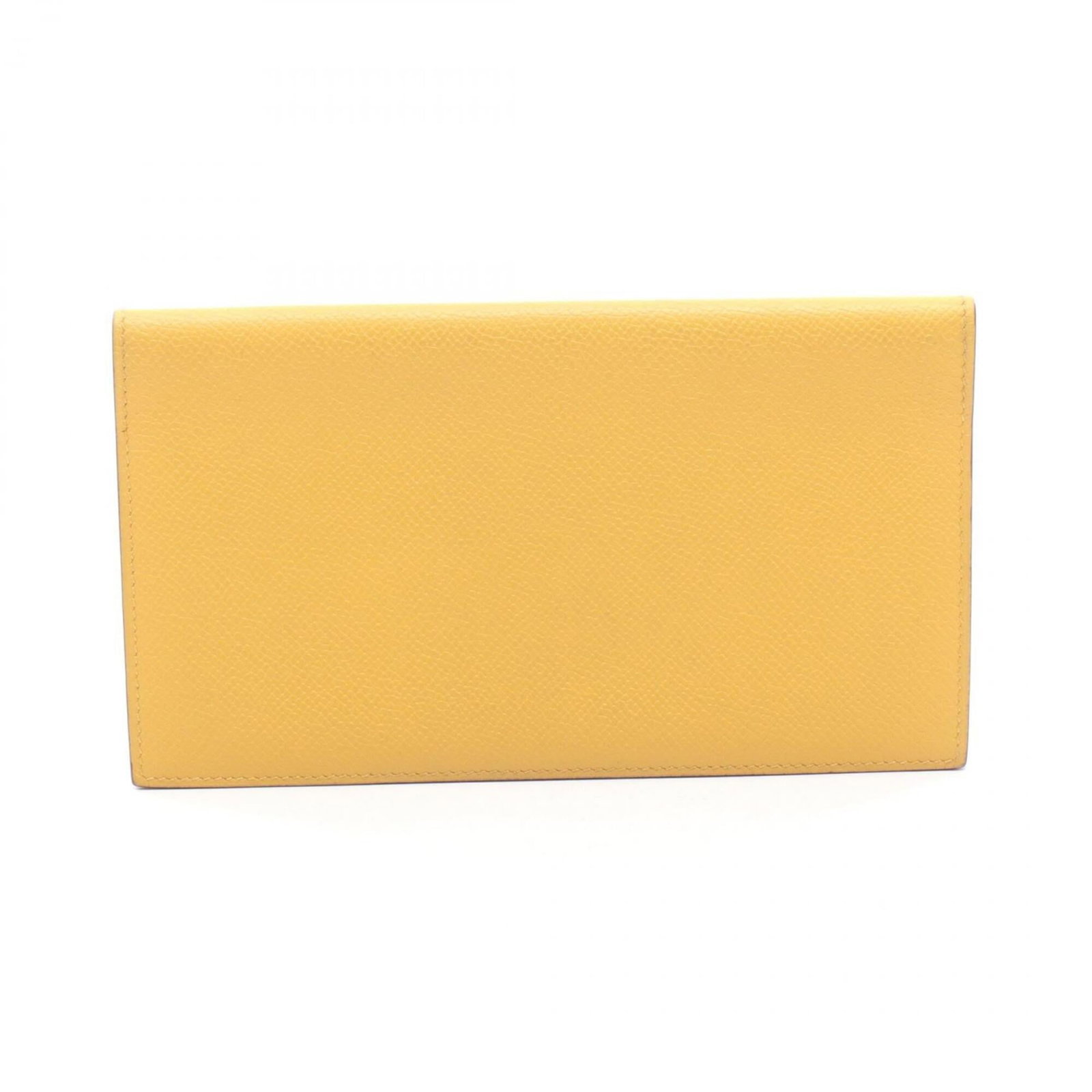 Epsom Leather Bi Fold Wallet Hermes: Epsom Leather Bi Fold Wallet Hermes Epsom leather bi-fold wallet from Hermes, featuring a classic design with a sun yellow color. This long wallet measures 10.5cm x 18.5cm x 1cm and boasts a sleek, co