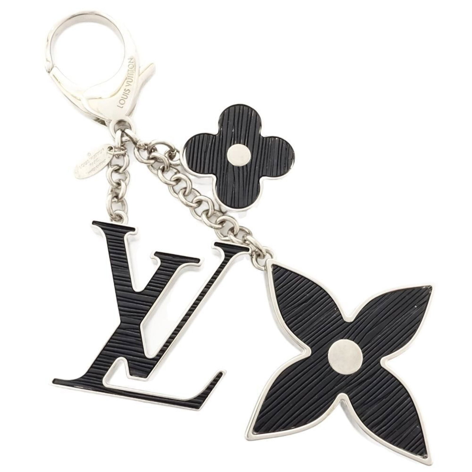 Keychain Louis Vuitton Women'S 182076 Gold Fleur De Bijou Sac Charm: Keychain Louis Vuitton Women'S 182076 Gold Fleur De Bijou Sac Charm Gold Fleur De Bijou Sac Charm Keychain from Louis Vuitton, featuring a 15cm gold chain with the iconic M65084 design. This elegant c