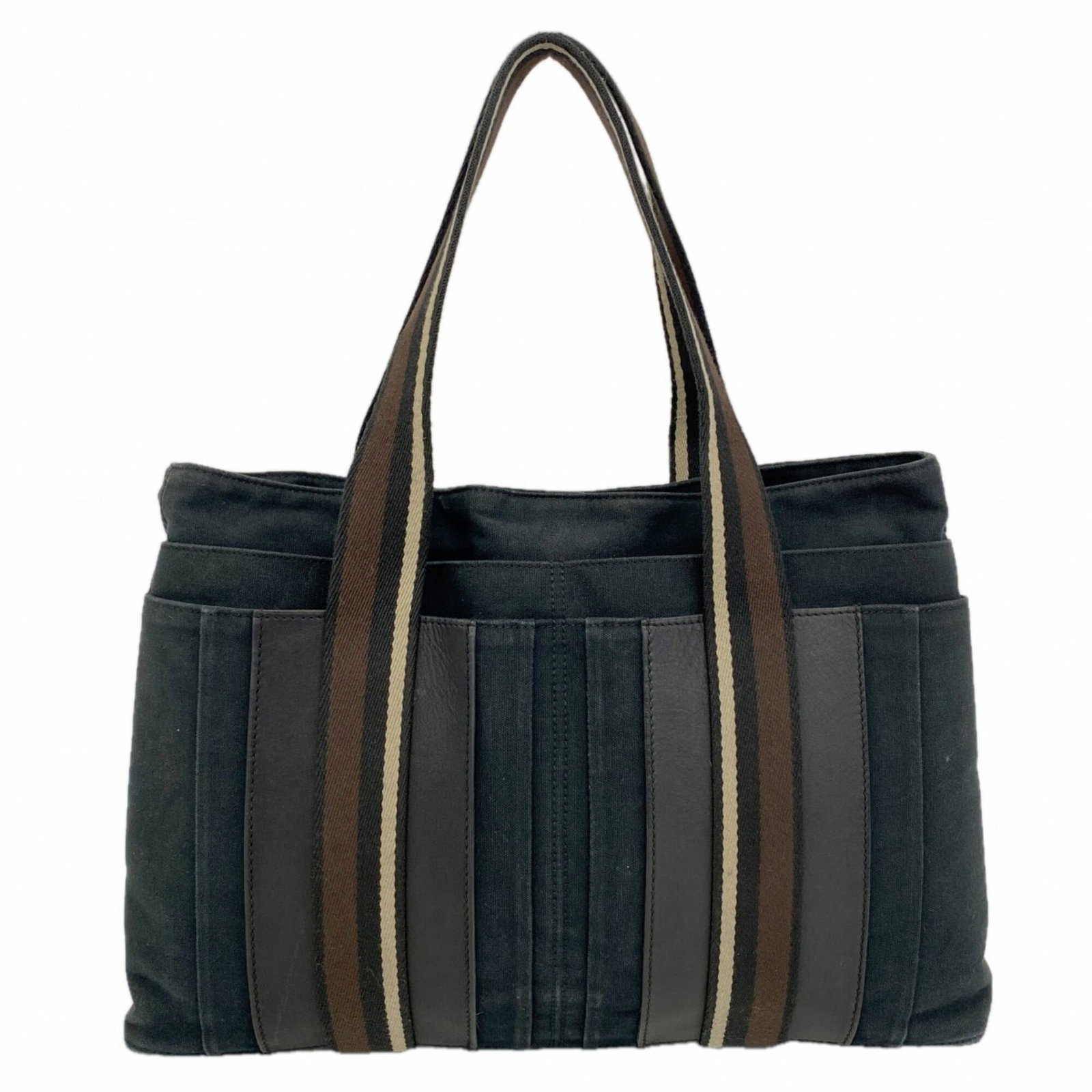 Canvas Hermes Tote Bag: Canvas Hermes Tote Bag Canvas tote bag from Hermes, made from high-quality canvas material in black and brown colors, with silver hardware. Measuring 28.5cm x 40cm x 8cm, it features a classic design 
