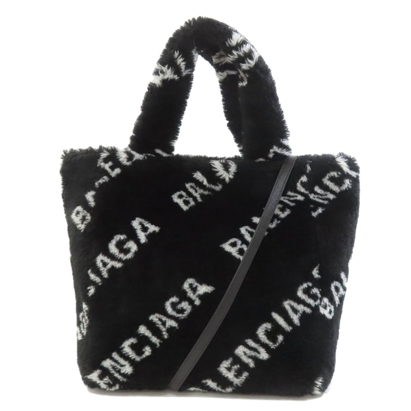 Handbag Fur: Handbag Fur Black fur handbag with a sleek design, measuring 28cm x 27cm x 13cm. The bag features a shoulder strap and comes in a fixed length range of 110cm - 134cm. Made from high-quality fur