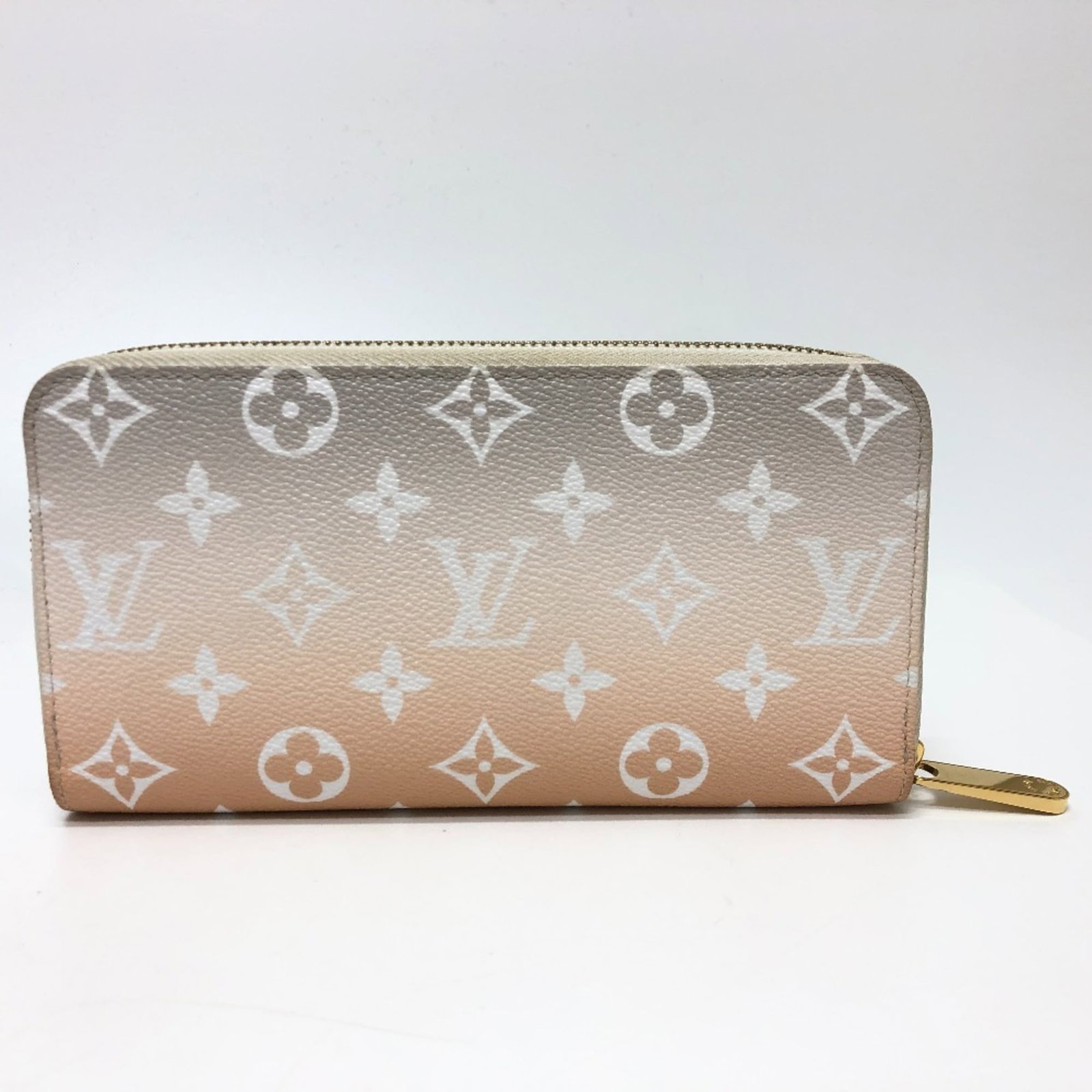 Canvas Bi Fold Wallet Long Louis Vuitton: Canvas Bi Fold Wallet Long Louis Vuitton Canvas Bi Fold Wallet Long Louis Vuitton in vibrant orange and white hues, featuring a classic bi-fold design with clean lines. This stylish wallet measures