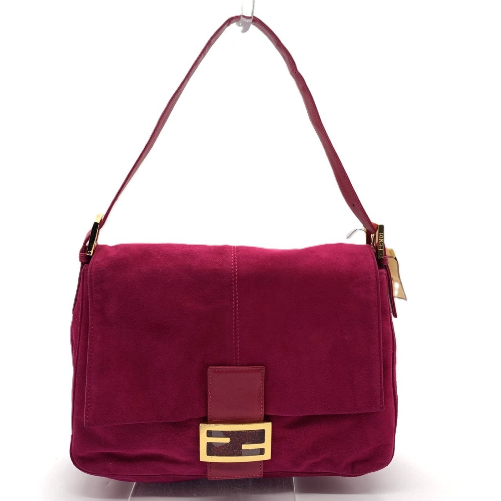 Handbag leather suede by Fendi: Handbag leather suede by Fendi Suede and leather handbag from Fendi, available in pink with a magnetic closure. Measuring 21cm x 29cm x 12cm, it features a handle length of 45cm to 57cm. This stylish 