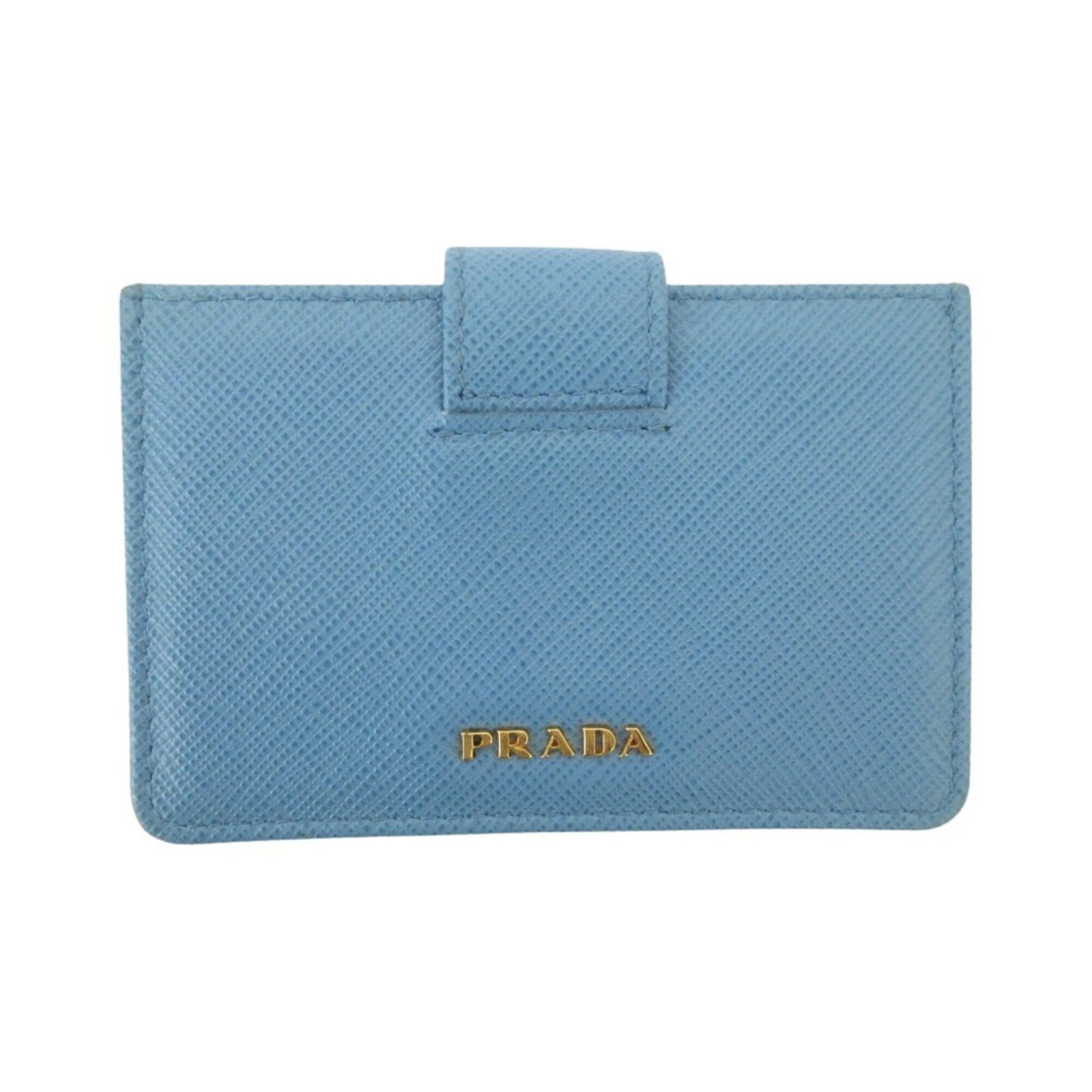 Business card case saffiano by prada: Business card case saffiano by prada Saffiano material provides durability and resistance to scratches. This business card case by Prada features a light blue color and measures 6.7cm x 10cm x 1cm.