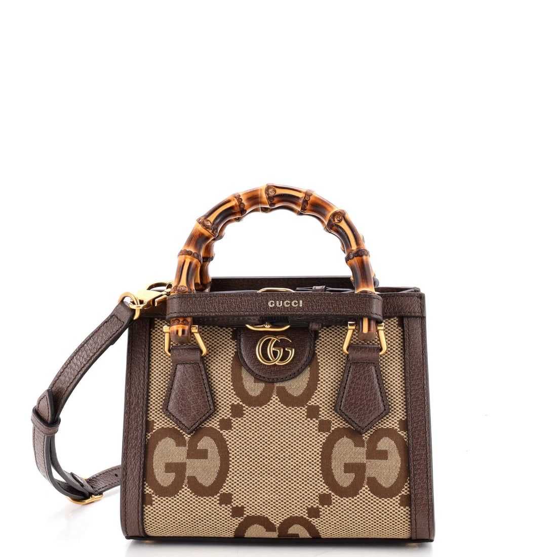 Diana Jumbo Bamboo Handle Mini Tote Canvas GG Gucci: Diana Jumbo Bamboo Handle Mini Tote Canvas GG Gucci The Diana Jumbo Bamboo Handle Mini Tote features Gucci's signature GG canvas design, paired with plain leather and bamboo accents in a rich brown ex