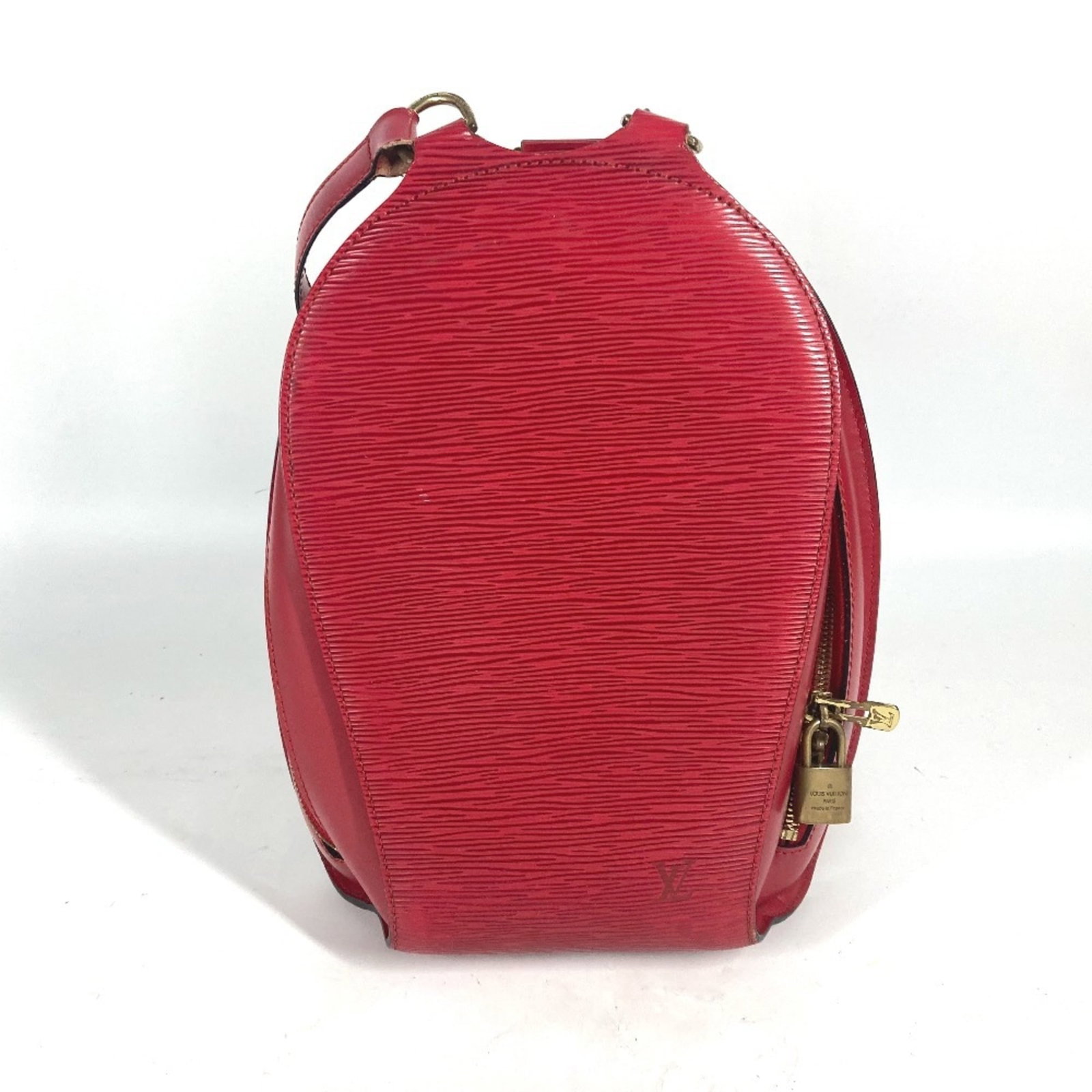 Epi leather backpack by Louis Vuitton: Epi leather backpack by Louis Vuitton Red Epi leather backpack by Louis Vuitton, measuring 28cm x 19.5cm x 7cm in size, features a distinctive red color and premium material construction. This stylish