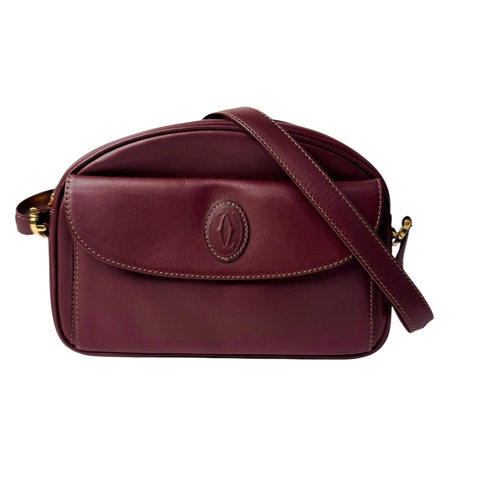 Shoulder Bag Leather by Cartier: Shoulder Bag Leather by Cartier Cartier's Bordeaux leather shoulder bag boasts a sleek design with clean lines and a compact size, making it perfect for everyday use. The bag measures 16cm x 28cm x 5c