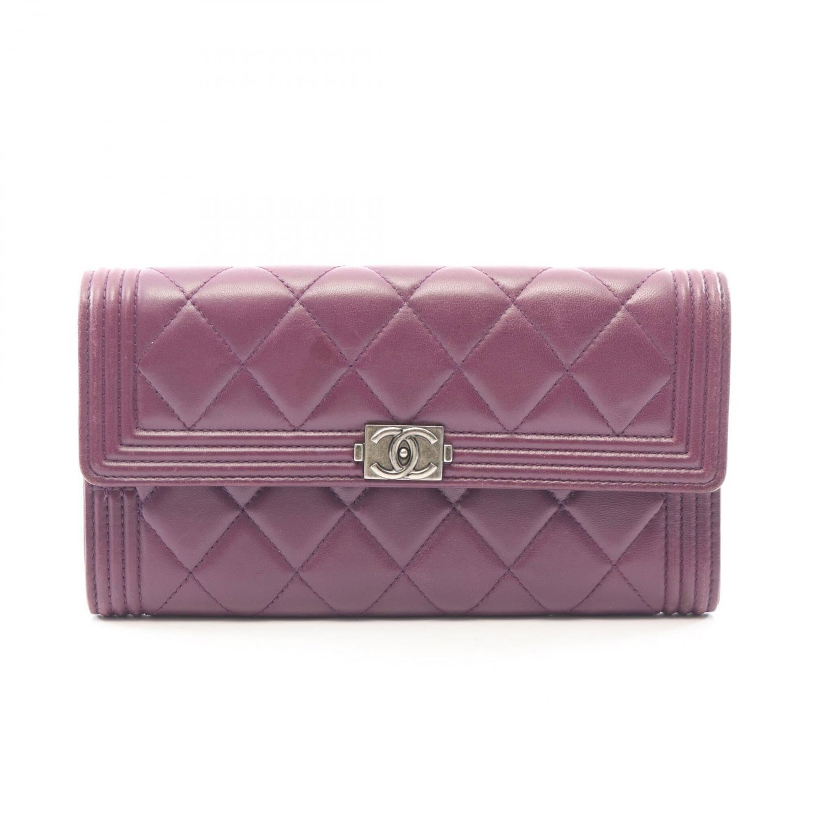Chanel Long Wallet (Bi-Fold) Leather: Chanel Long Wallet (Bi-Fold) Leather The Chanel Long Wallet (Bi-Fold) Leather features a rich purple lambskin exterior, showcasing the iconic brand's signature style. Measuring 10.5cm x 19.5cm x 3cm,