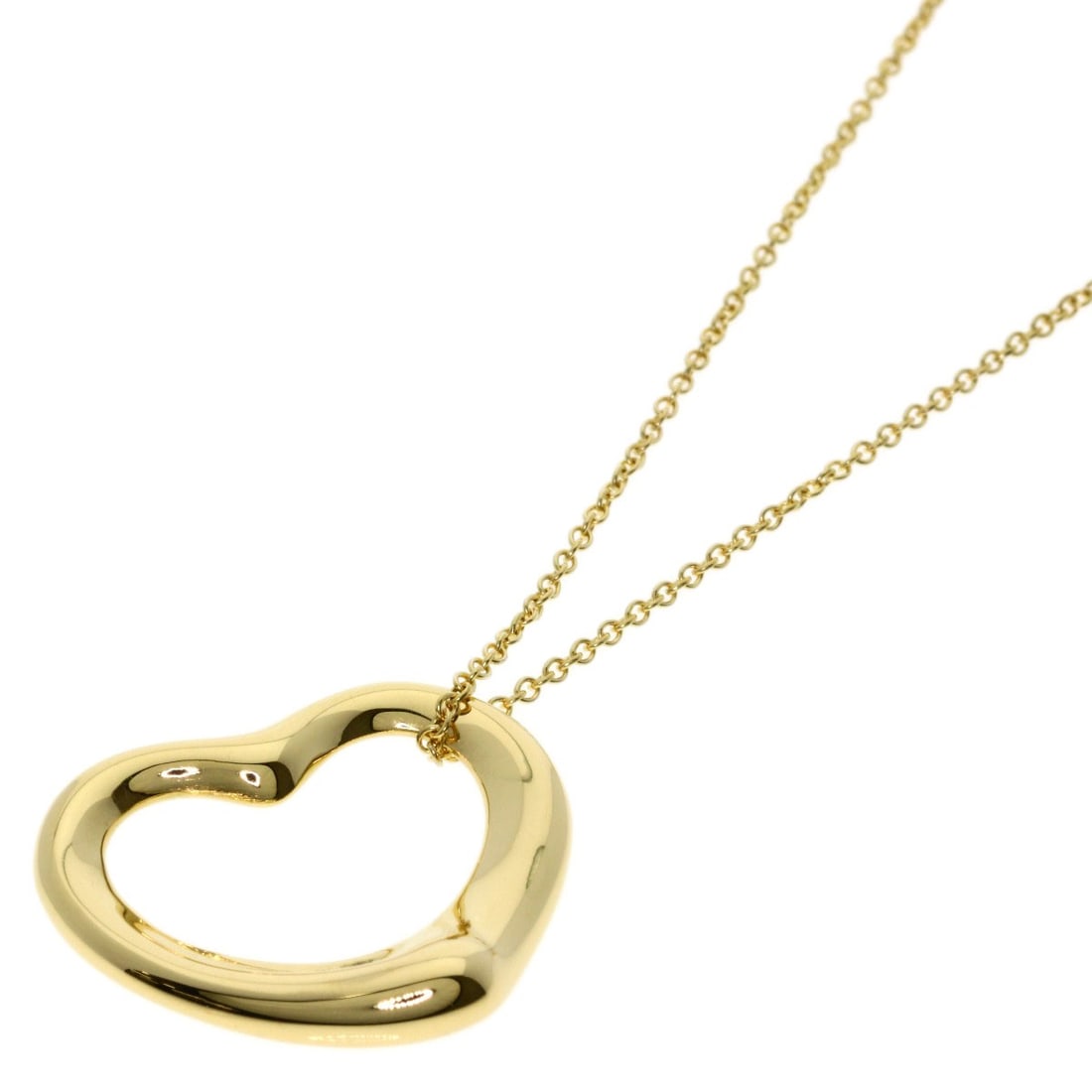 Yellow Gold Tiffany Necklace K18 Open Heart: Yellow Gold Tiffany Necklace K18 Open Heart K18 Yellow Gold Tiffany Necklace Open Heart features a sleek, gold metal design with no main stone. The necklace measures 15.7 inches in length and boasts t