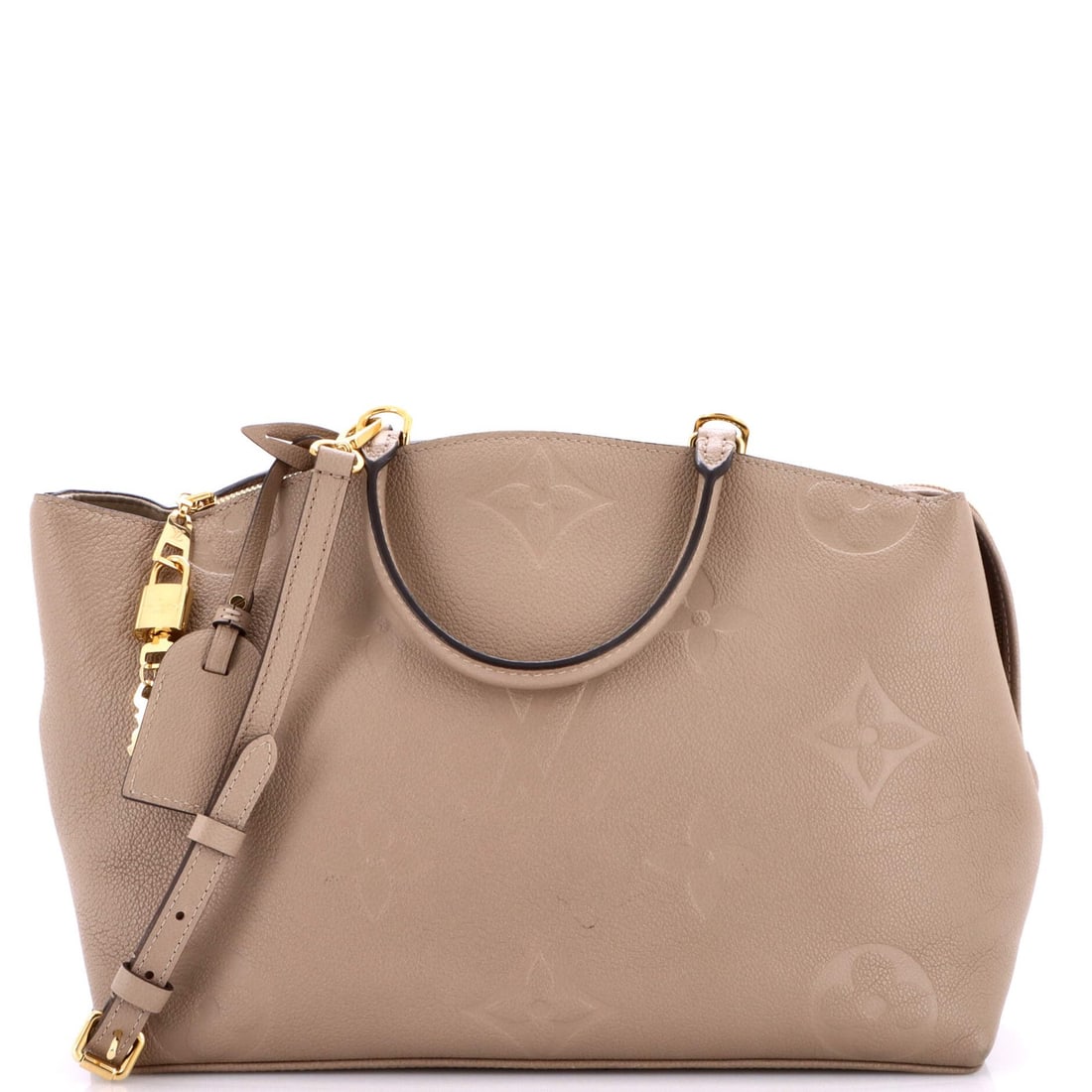Louis Vuitton Grand Palais Handbag Monogram Giant Empreinte: Louis Vuitton Grand Palais Handbag Monogram Giant Empreinte The Louis Vuitton Grand Palais Handbag Monogram Giant Empreinte boasts a neutral exterior with the iconic giant monogram pattern, adding an 