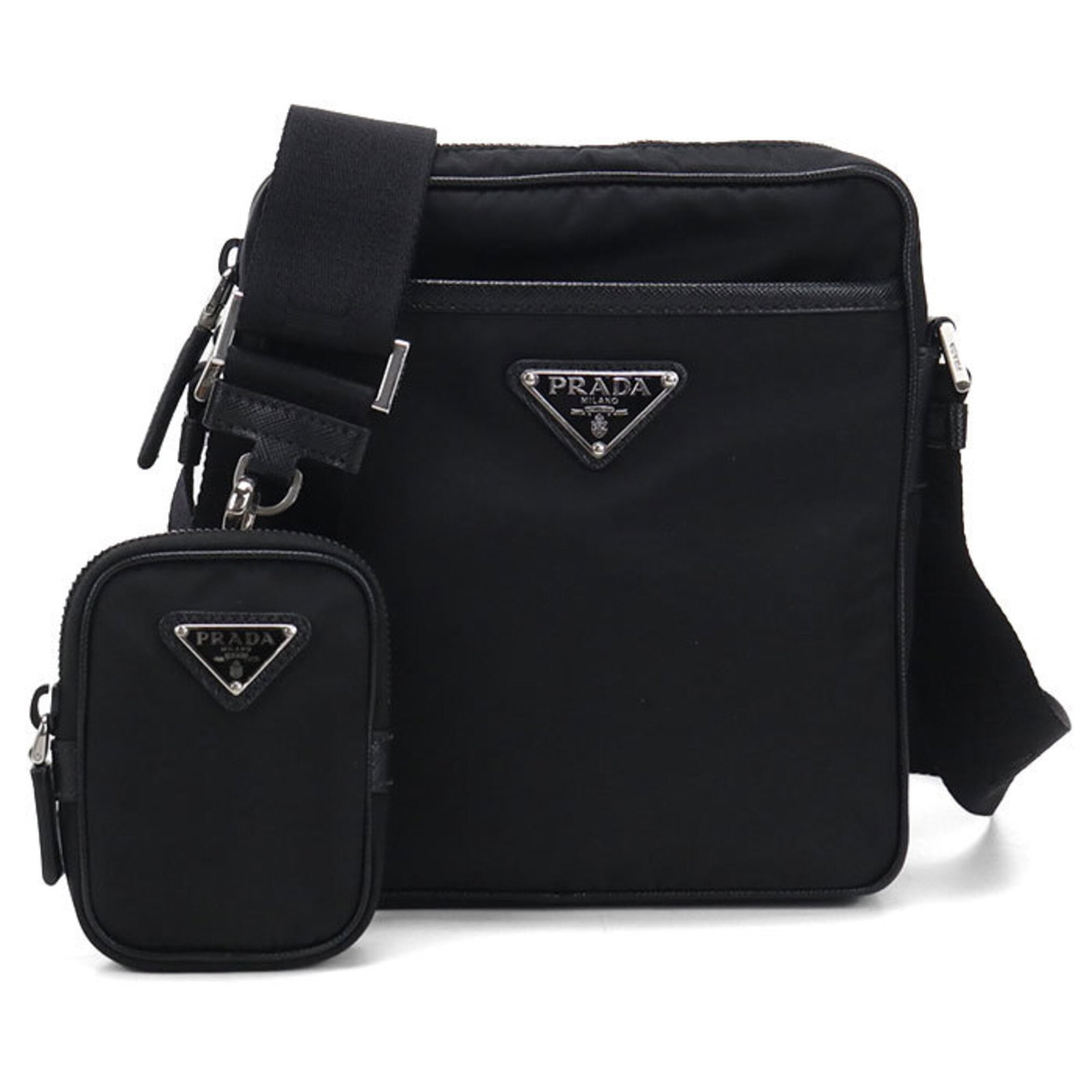 Shoulder Bag Nylon Prada: Shoulder Bag Nylon Prada The Prada Country shoulder bag features a sleek black nylon design with silver hardware, making for a stylish and versatile accessory. Measuring 20cm x 17.5cm x 5cm, it is a