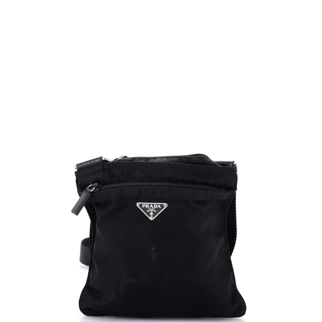 Prada Flat Messenger Bag Tessuto Small: Prada Flat Messenger Bag Tessuto Small Black Prada Flat Messenger Bag Tessuto Small in Fair Condition. This small cross-body bag features scuffs, stains, and creases on the exterior nylon surface, wit