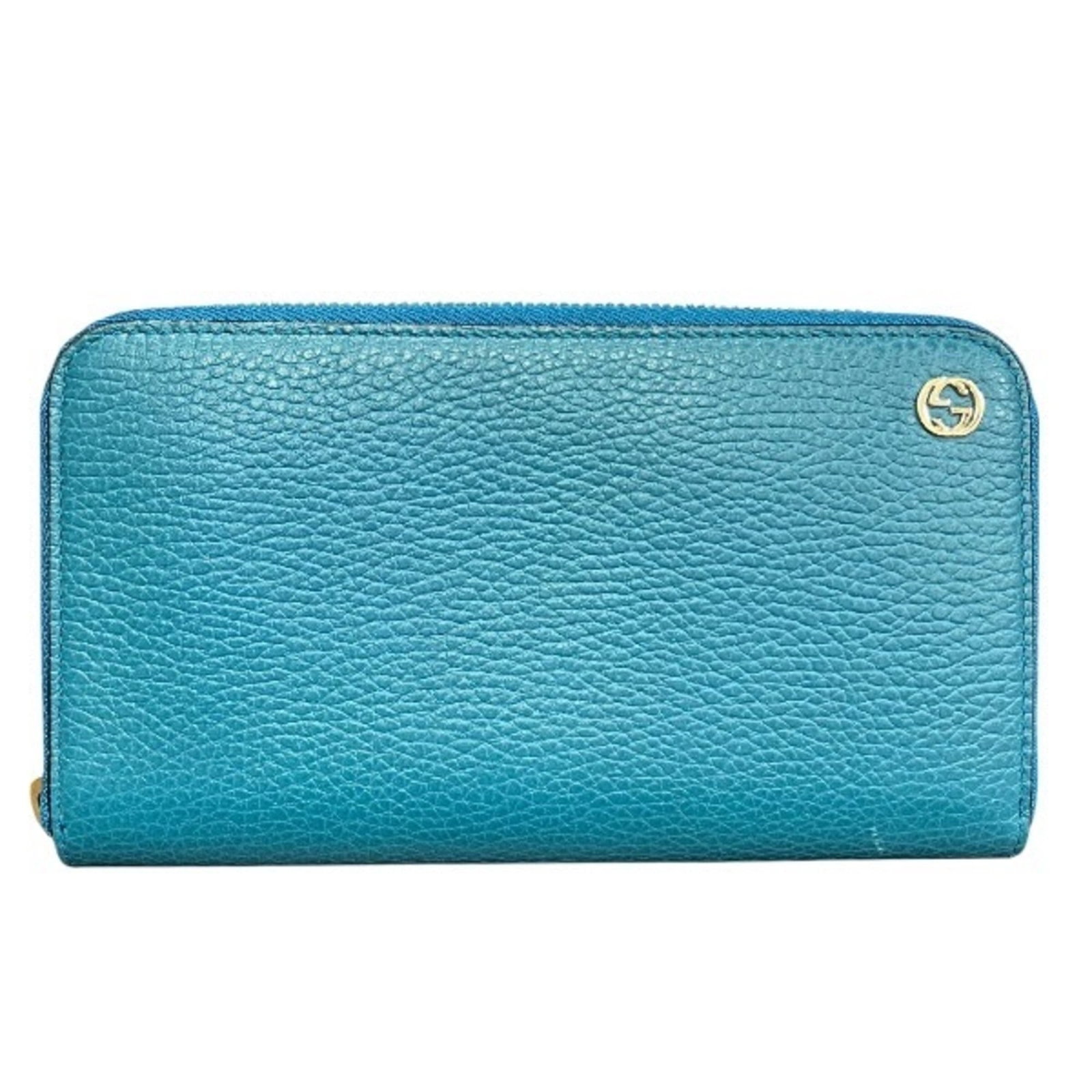 Gucci wallet leather bi fold: Gucci wallet leather bi fold Turquoise Gucci MPN 449347 bi-fold wallet features long, leather design with dimensions 11cm x 19cm x 2.5cm. The item's material and color are explicitly stated,