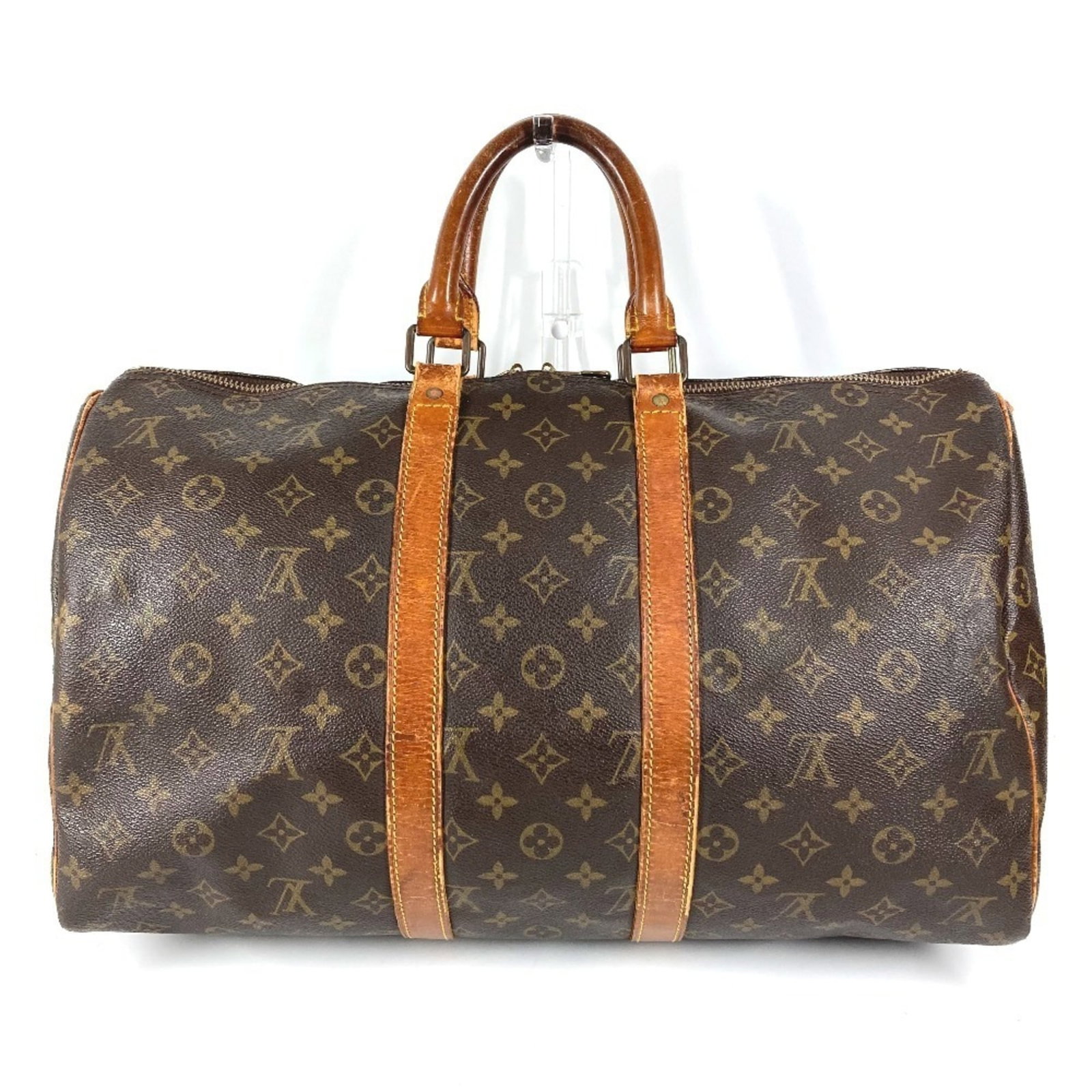 Handbag with Monogram Louis Vuitton Bag from Boston: Handbag with Monogram Louis Vuitton Bag from Boston The Louis Vuitton Monogram Boston bag boasts its signature brown, galle, and monogram design, making it a stylish accessory for any occasion.