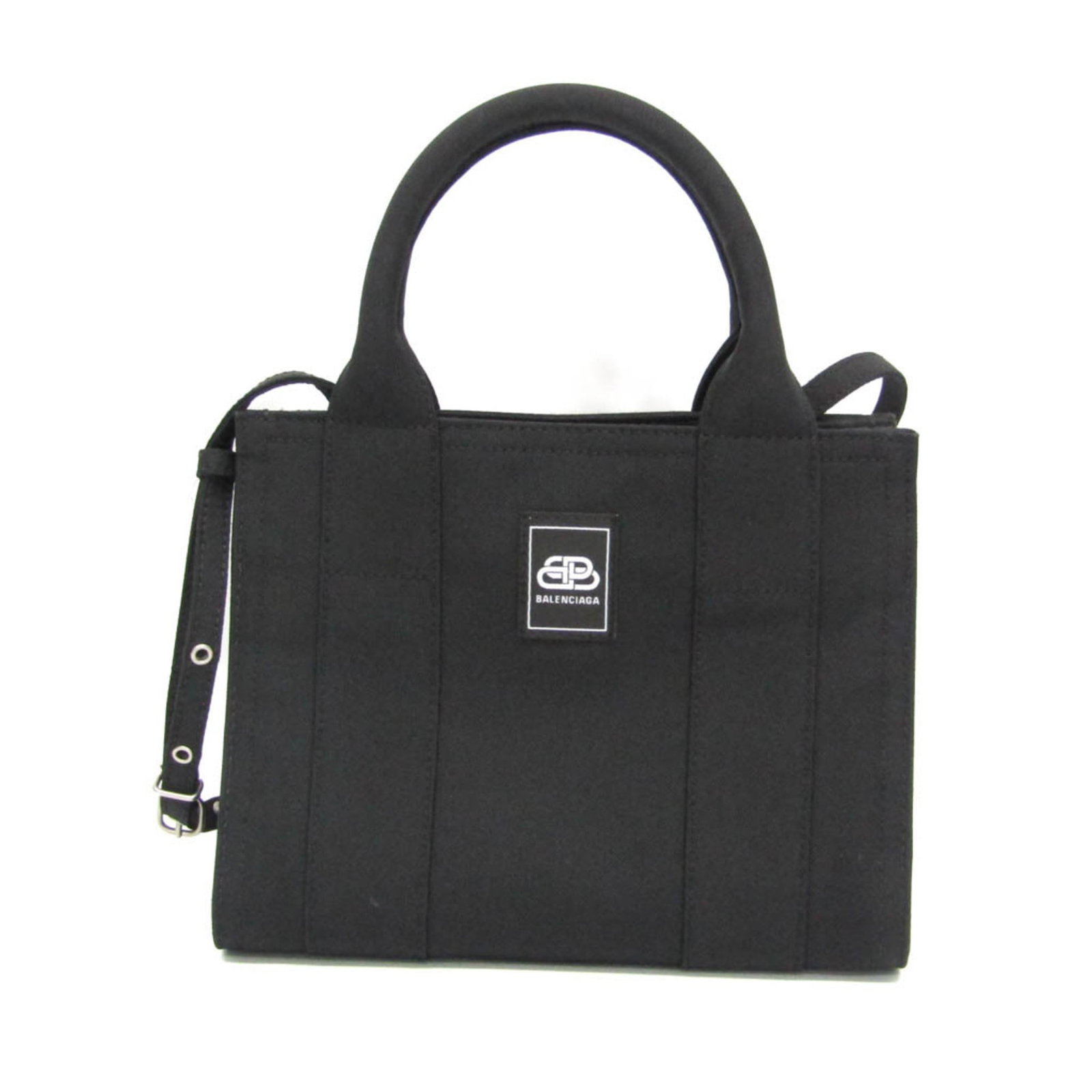 Handbag Polyamide Bag Shoulder Balenciaga: Handbag Polyamide Bag Shoulder Balenciaga Black Balenciaga shoulder bag made from polyamide, featuring a magnetic snap closure and zipper pocket. Measuring 18cm x 23cm x 9cm, it has adjustable straps