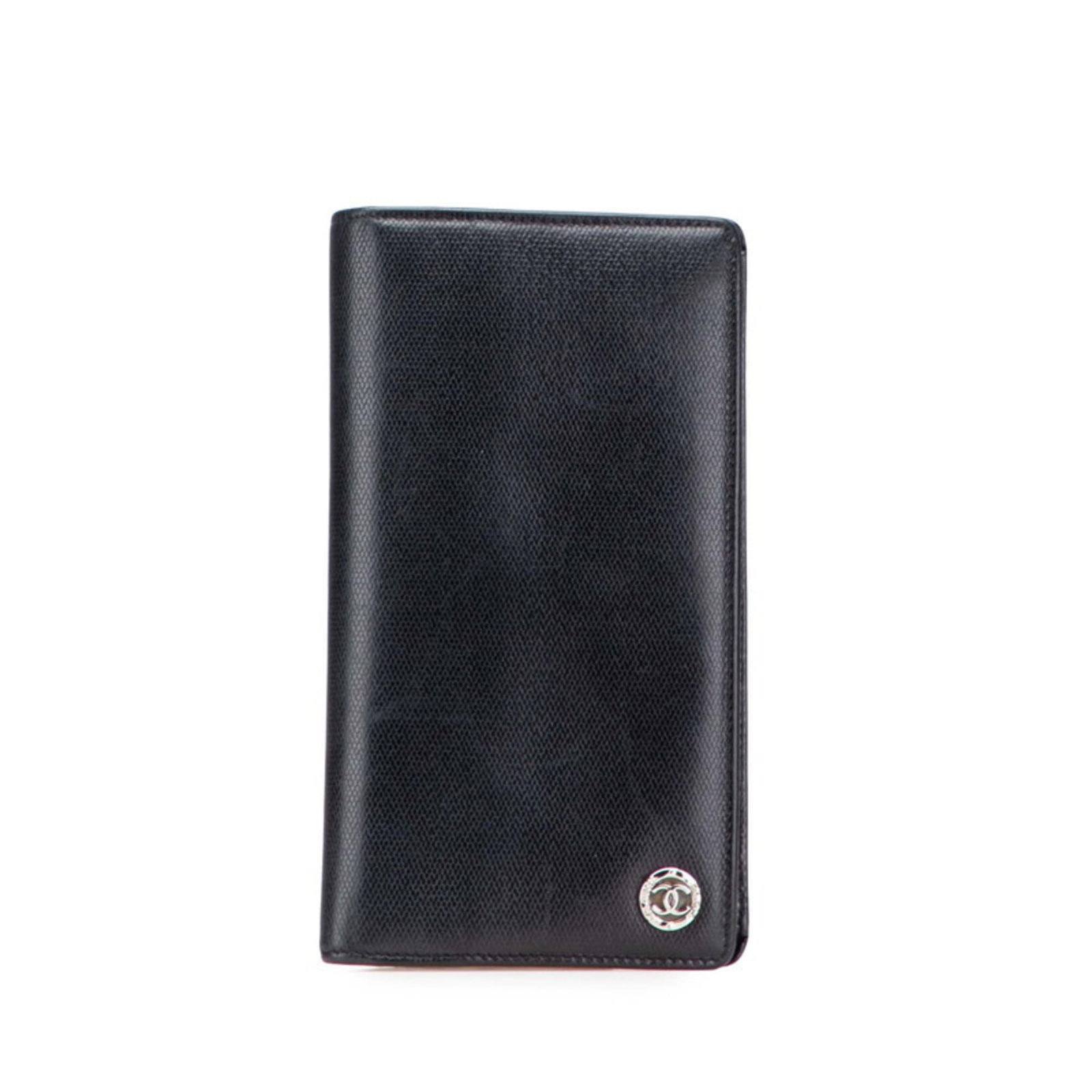 Chanel Long Wallet (Bi-Fold) Leather: Chanel Long Wallet (Bi-Fold) Leather Black leather bi-fold wallet from Chanel, with a classic flap closure and dimensions of 18cm x 10cm x 2cm. This long wallet features timeless design and sleek styl
