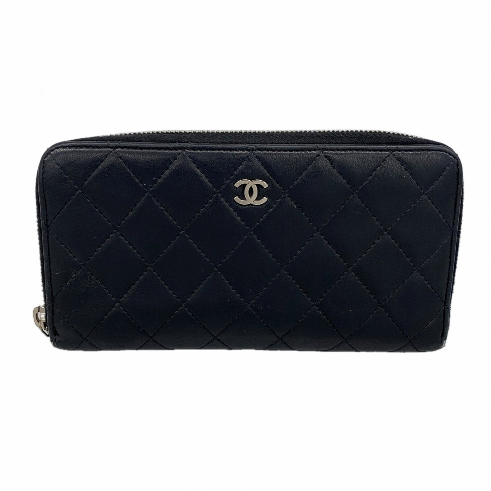 Chanel Long Wallet (Bi-Fold) Leather: Chanel Long Wallet (Bi-Fold) Leather The Chanel Long Wallet (Bi-Fold) Leather features sleek, black lambskin construction and a classic bi-fold design. Measuring 10cm x 19.5cm x 2cm, it provides