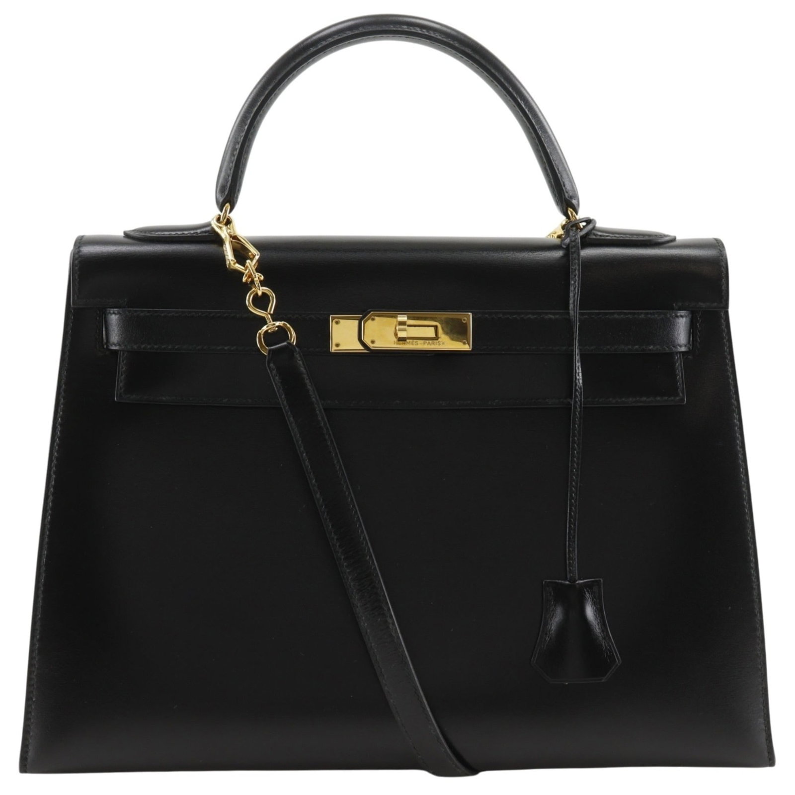 Calf Leather Handbag Hermes: Calf Leather Handbag Hermes Box calf leather construction provides durability and elegance, while the classic black color ensures timeless sophistication. This Kelly handbag features gold hardware