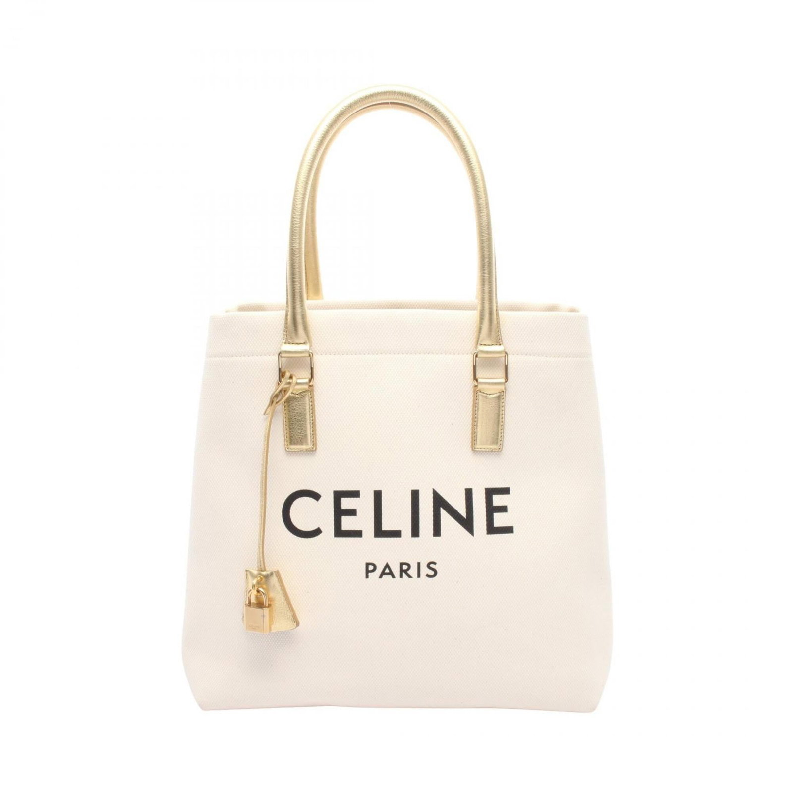 Canvas leather tote bag handbag celine: Canvas leather tote bag handbag celine Canvas leather tote bag with gold and white accents, bearing a signature. Made from canvas and leather, this Celine handbag measures 33cm x 34cm x 19cm. Its